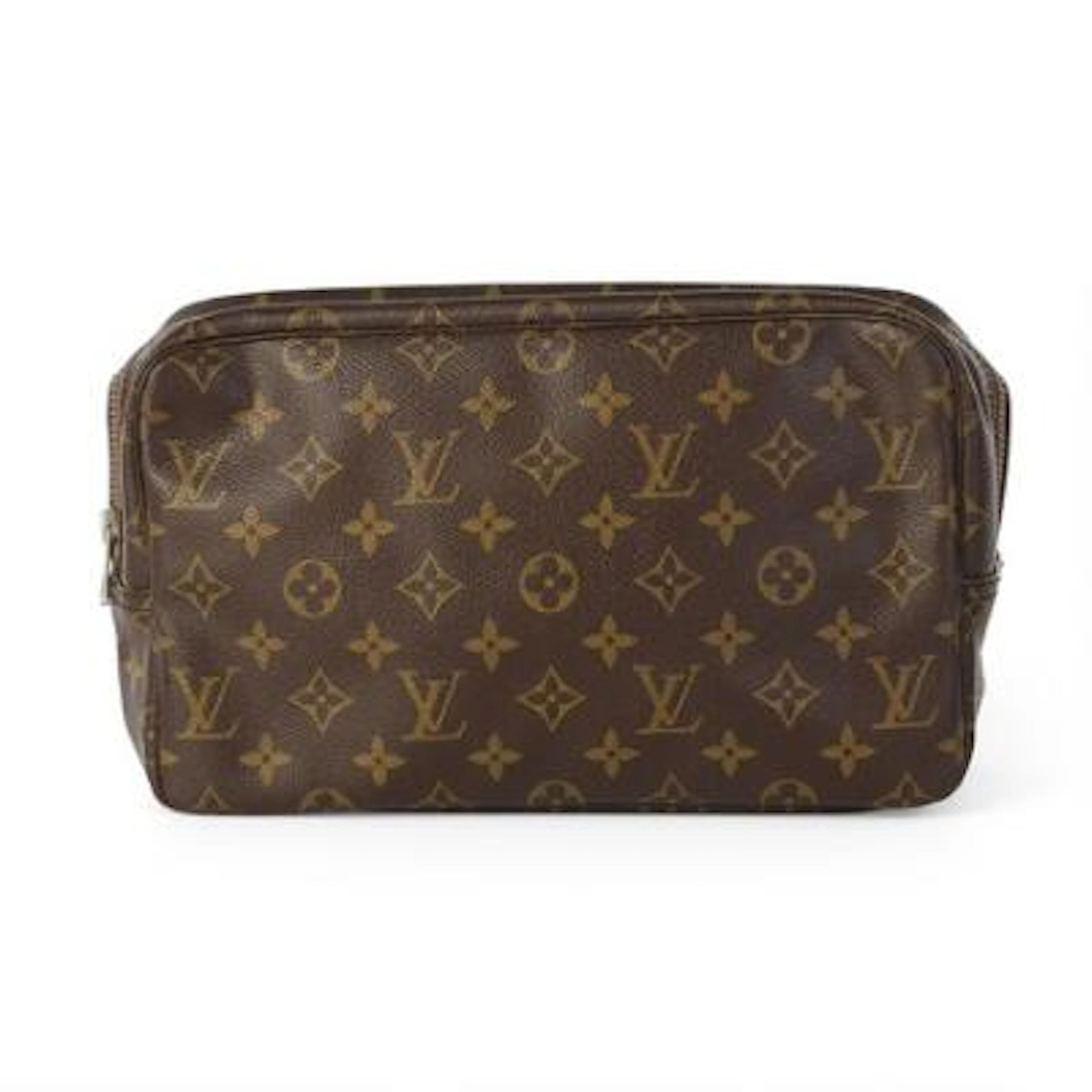 Louis Vuitton: A "Trousse Toilette 28" of brown monogram canvas with