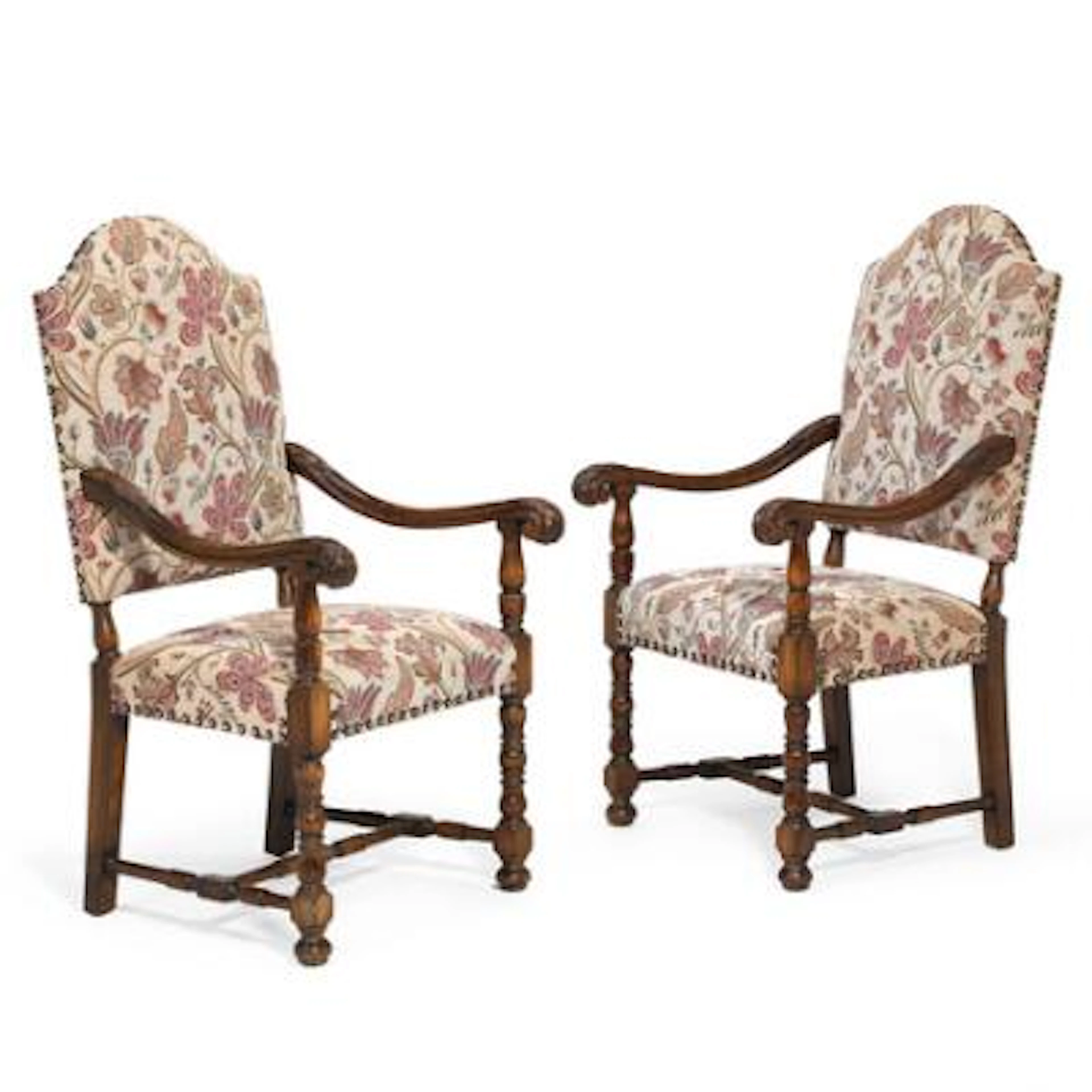 A pair of Baroque style dark polished wood armchairs. 20th century.