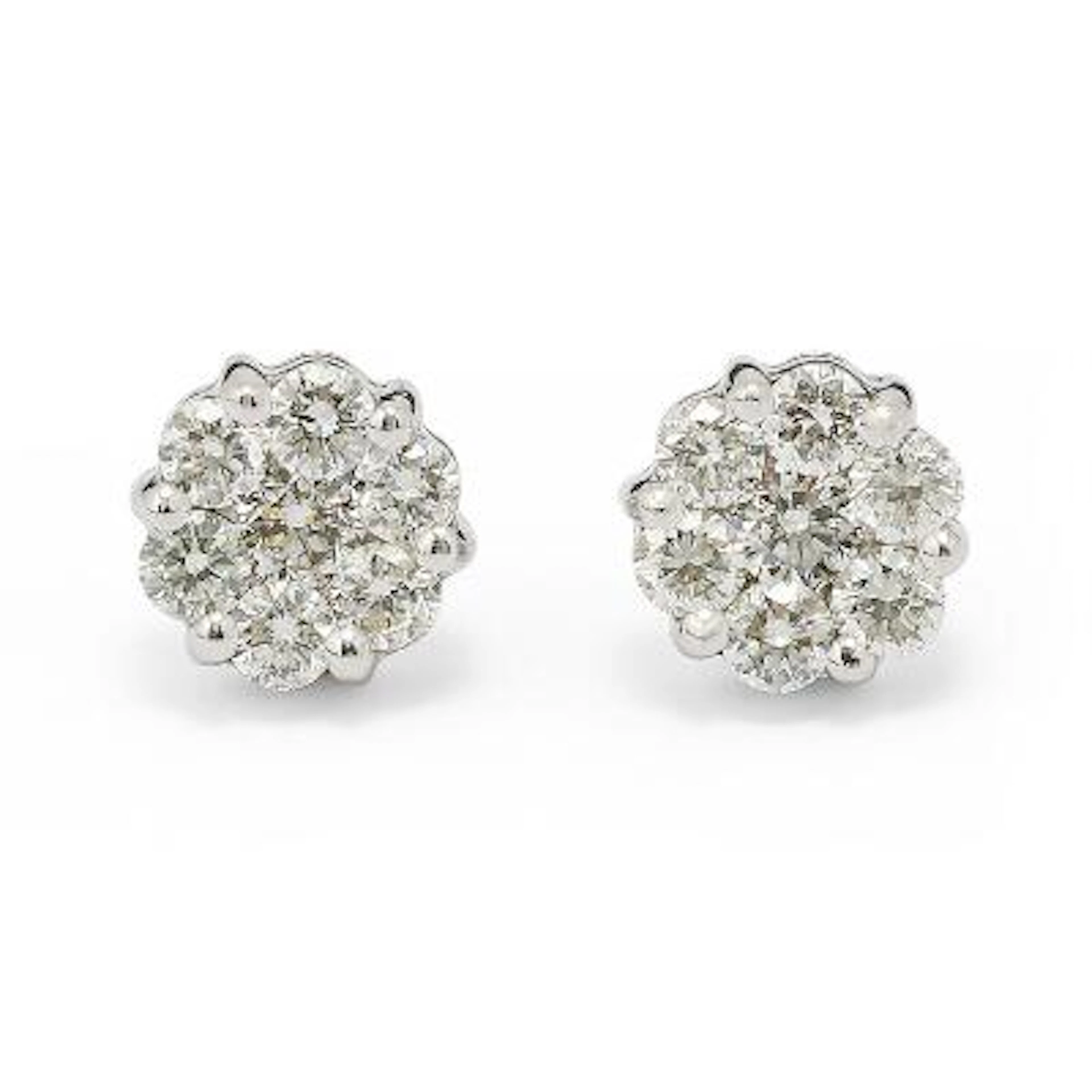 A pair of ear studs each set with numerous diamonds weighing a total