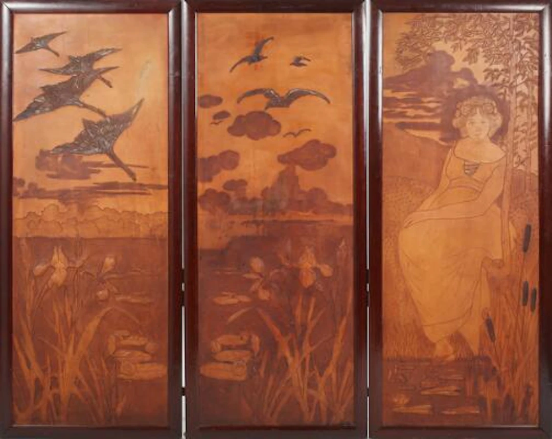 Three-part Art Nouveau wall panel of embossed leather. Circa 1900.