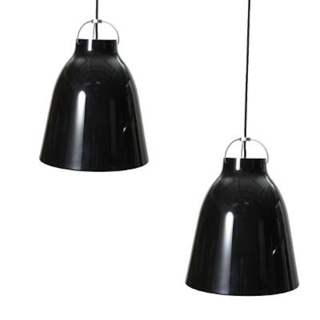 Cecilie Manz: “Caravaggio P3". A pair of black lacquered metal pendants.