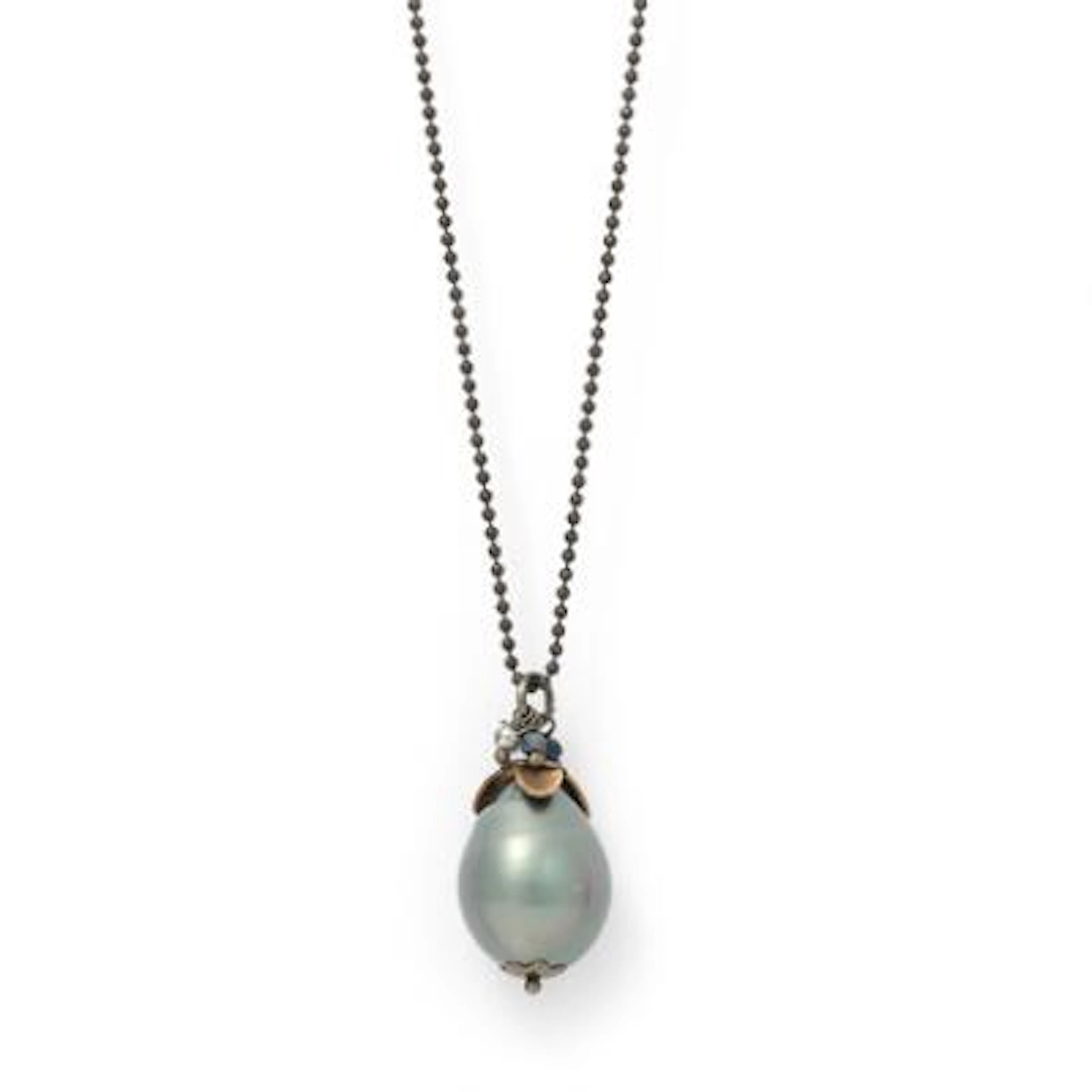 A necklace set with a pearl pendant set wih crystal beads, mounted
