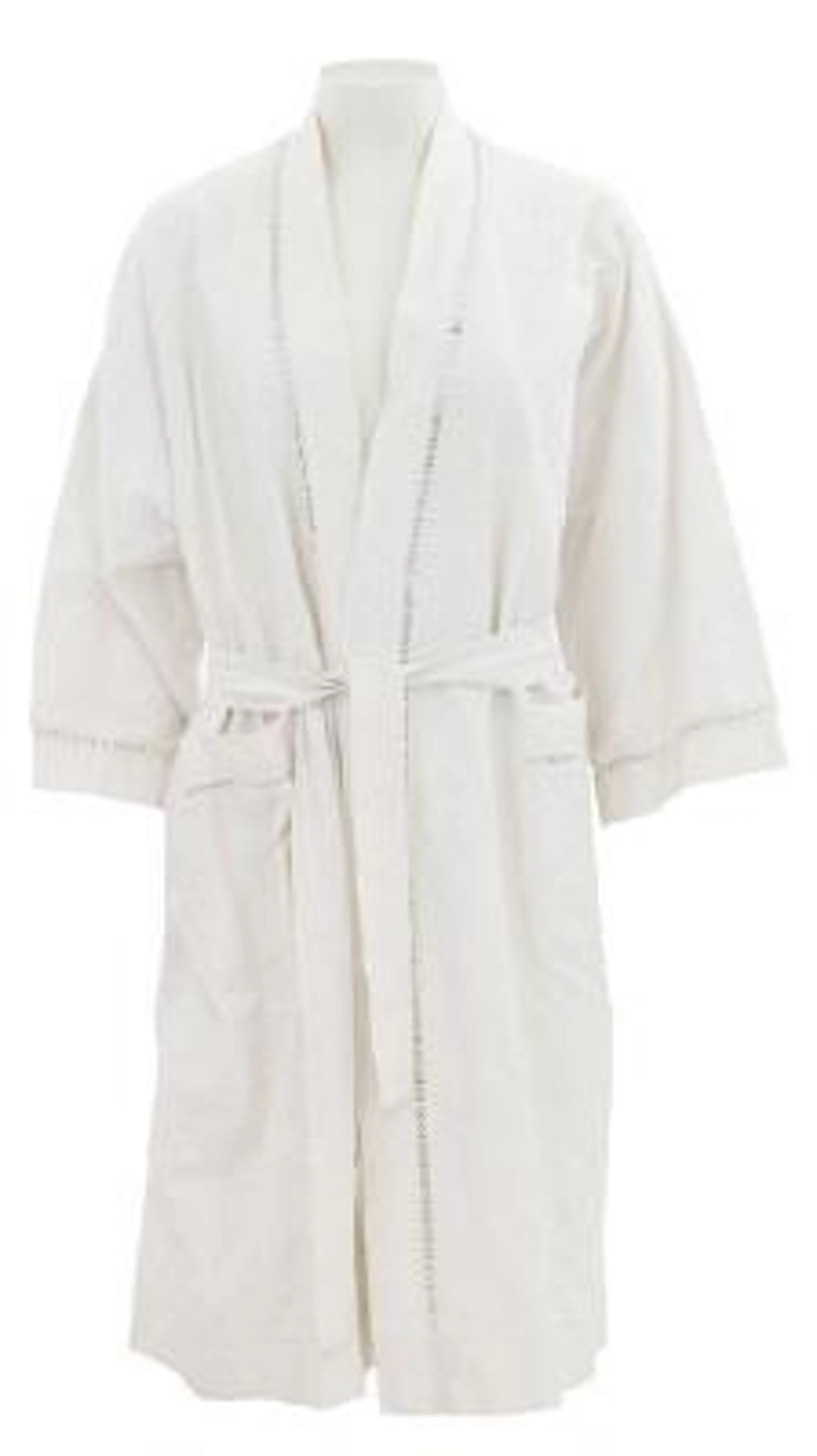 Christian Dior: A vintage white robe with lace details, two pockets