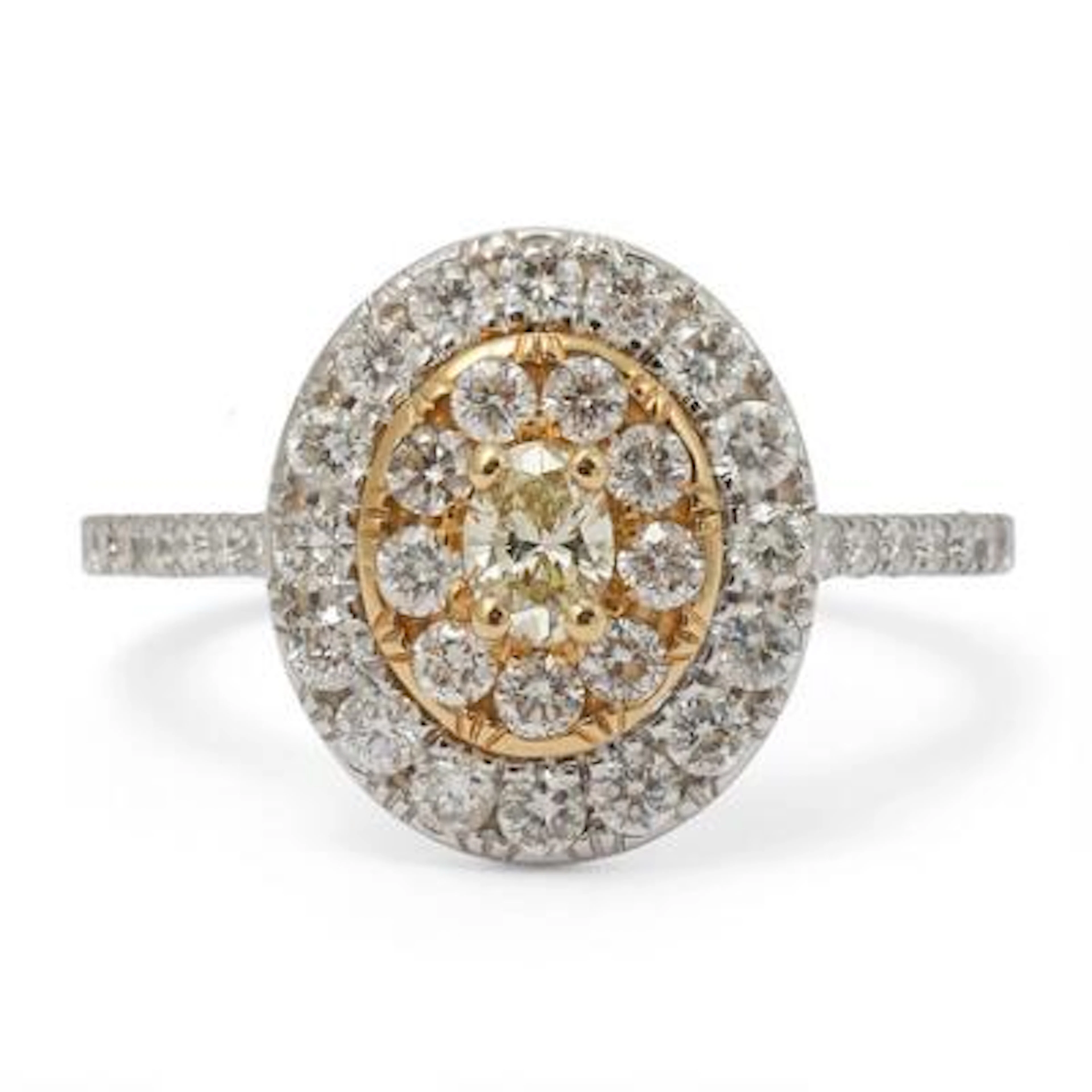 A diamond ring set with a yellow diamond encircled by numerous diamonds
