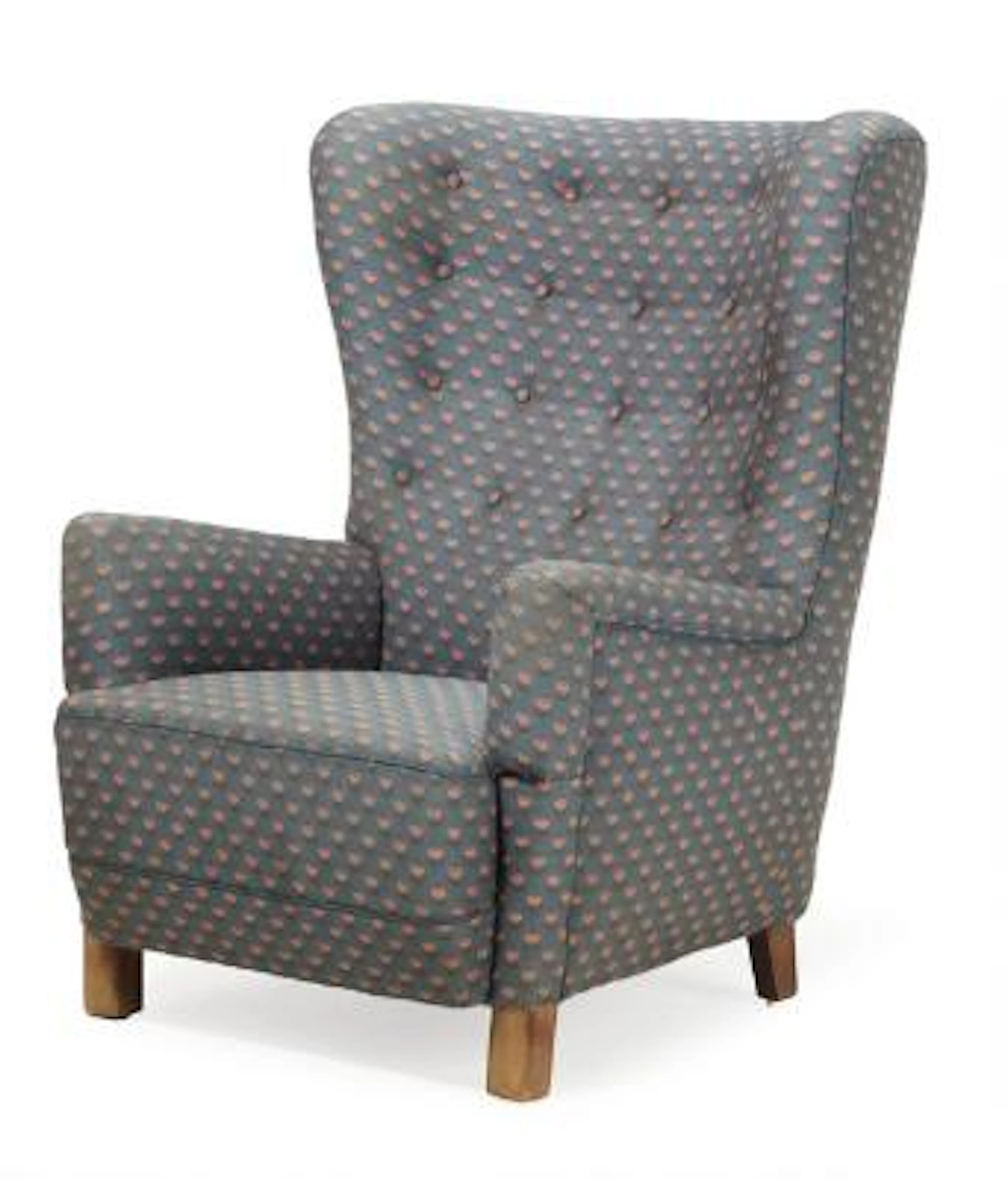 Danish cabinetmaker: High backed easy chair with stained beech legs