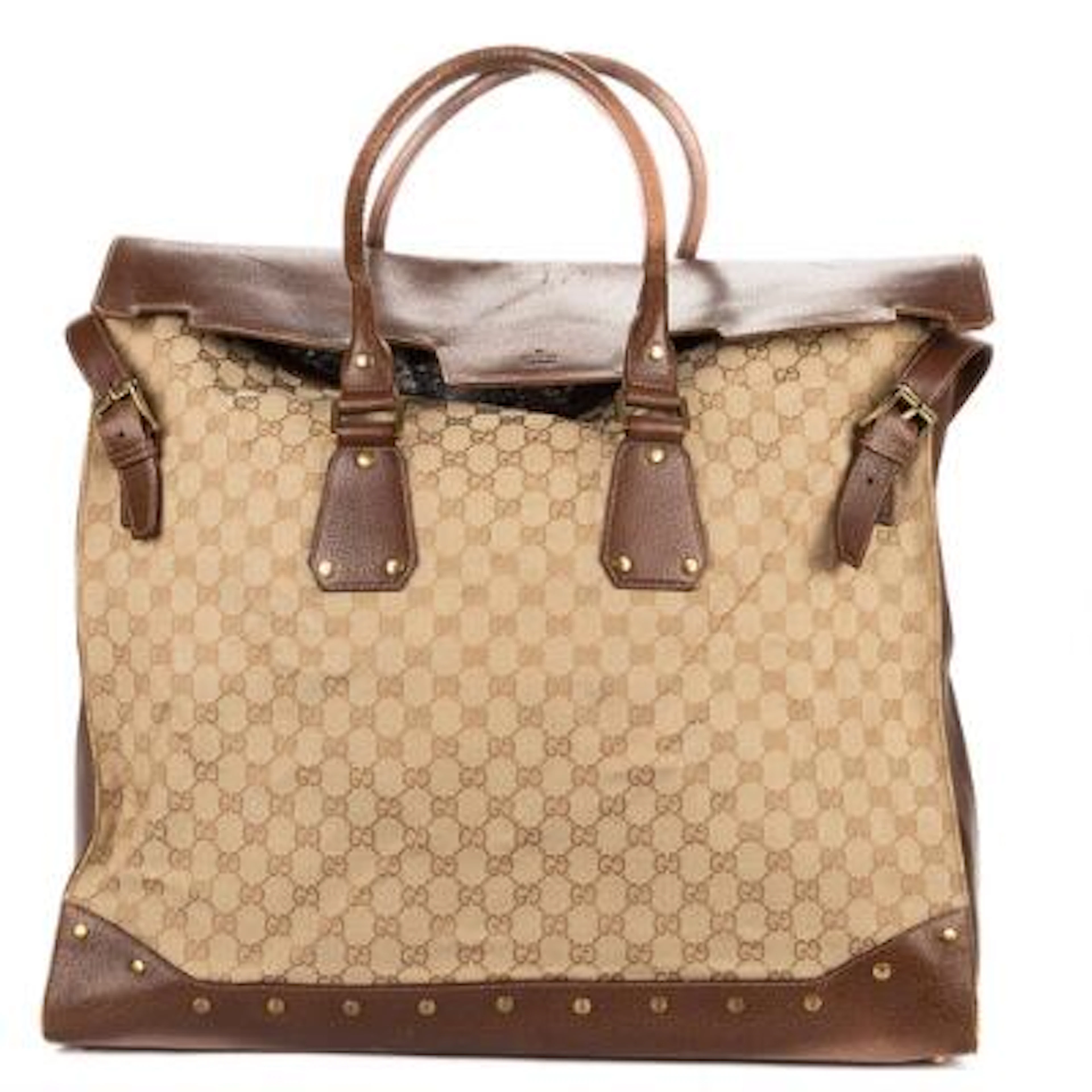 Gucci: A "Trophy Tote Bag" in beige monogram canvas with brown leather