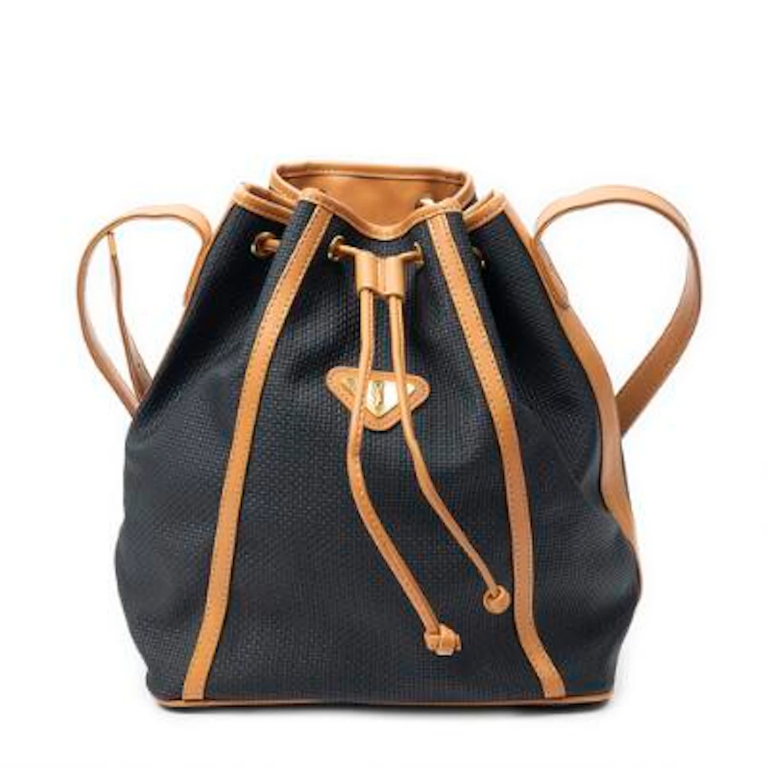 Yves Saint Laurent: A "Vintage Drawstring Bucket" bag in black woven