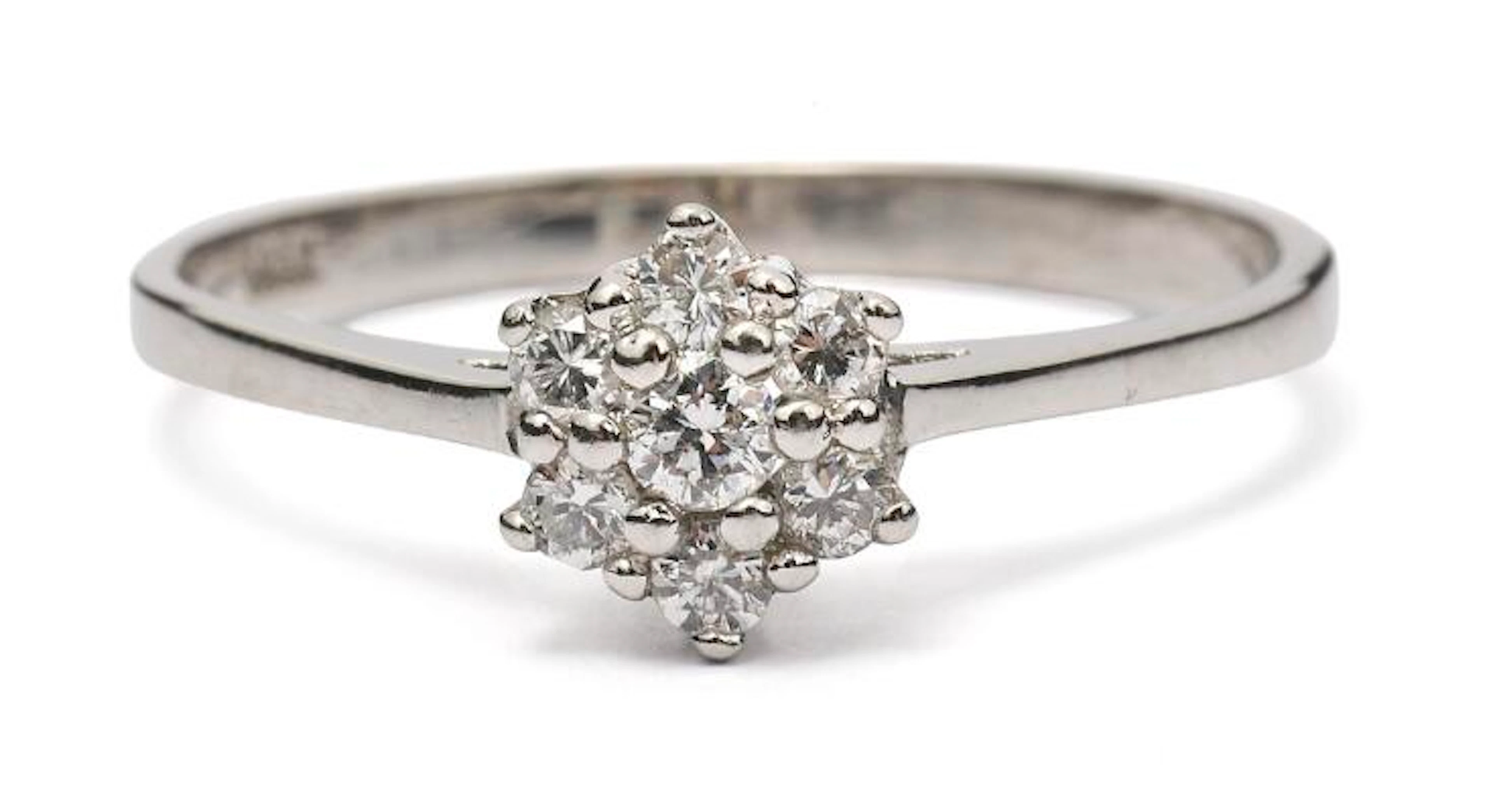 A diamond ring set with brilliant-cut diamonds, mounted in 14k white