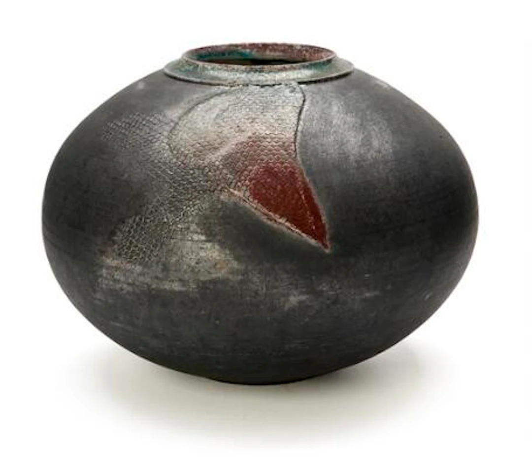 Per Weiss: A round stoneware vase decorated with matte metallic-grey