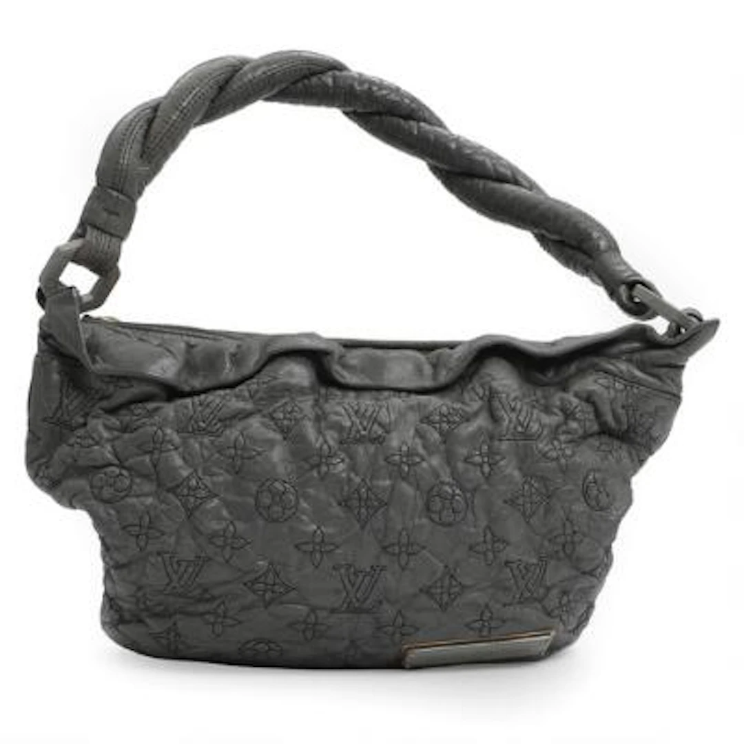 Louis Vuitton: "Olympe Nimbus" of grey monogram leather with gold