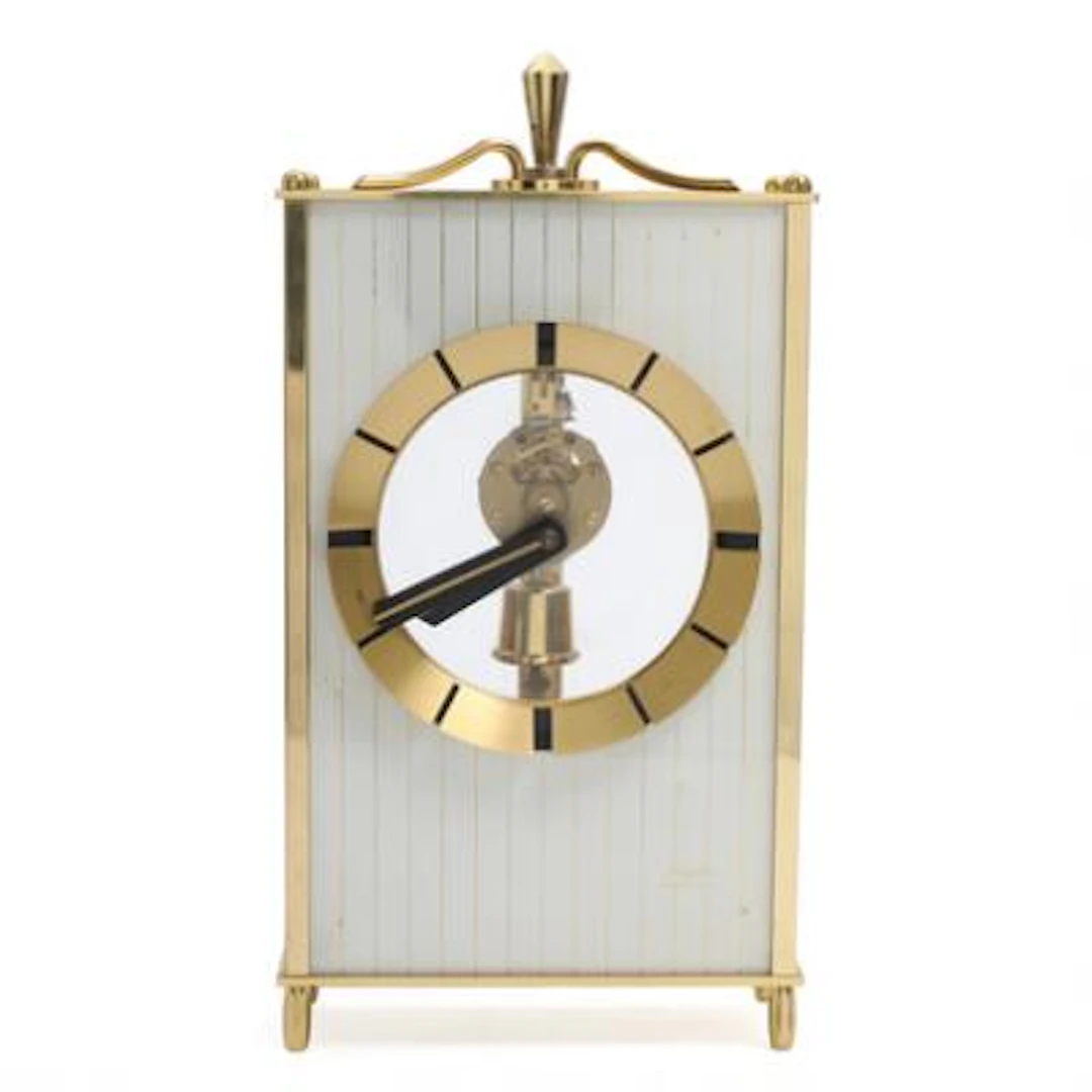 German mantel clock in case of gilt brass. Kundo. 1960s. H. 27. L.
