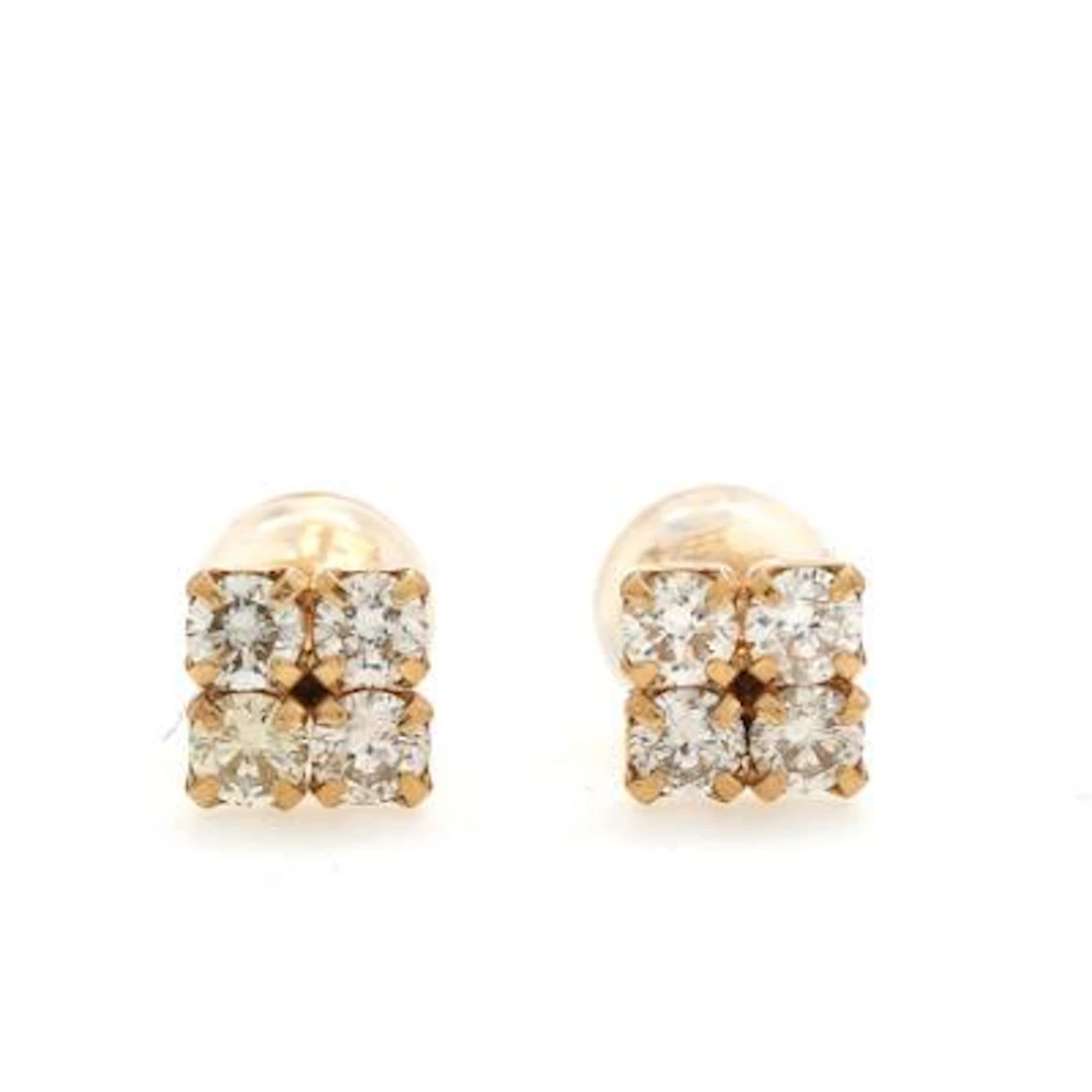 A pair of diamond ear studs each set with four brilliant-cut diamonds