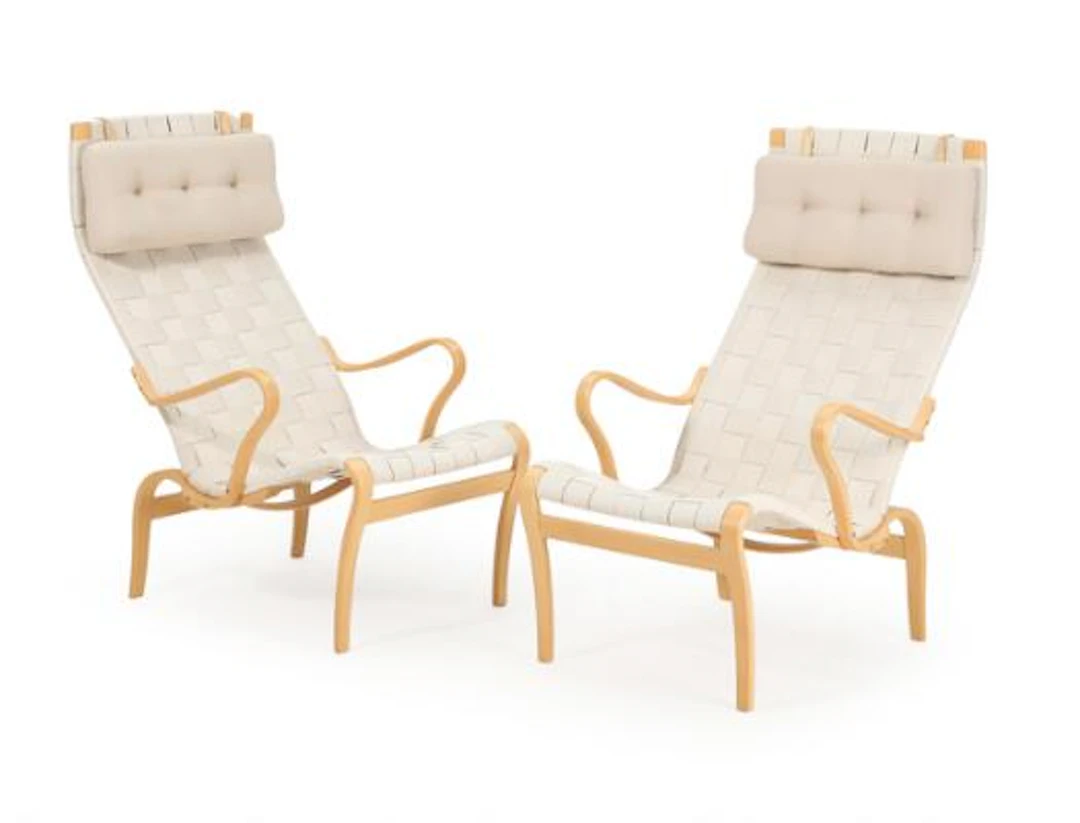 Bruno Mathsson: "Miranda". A pair of beech easy chairs, suspended