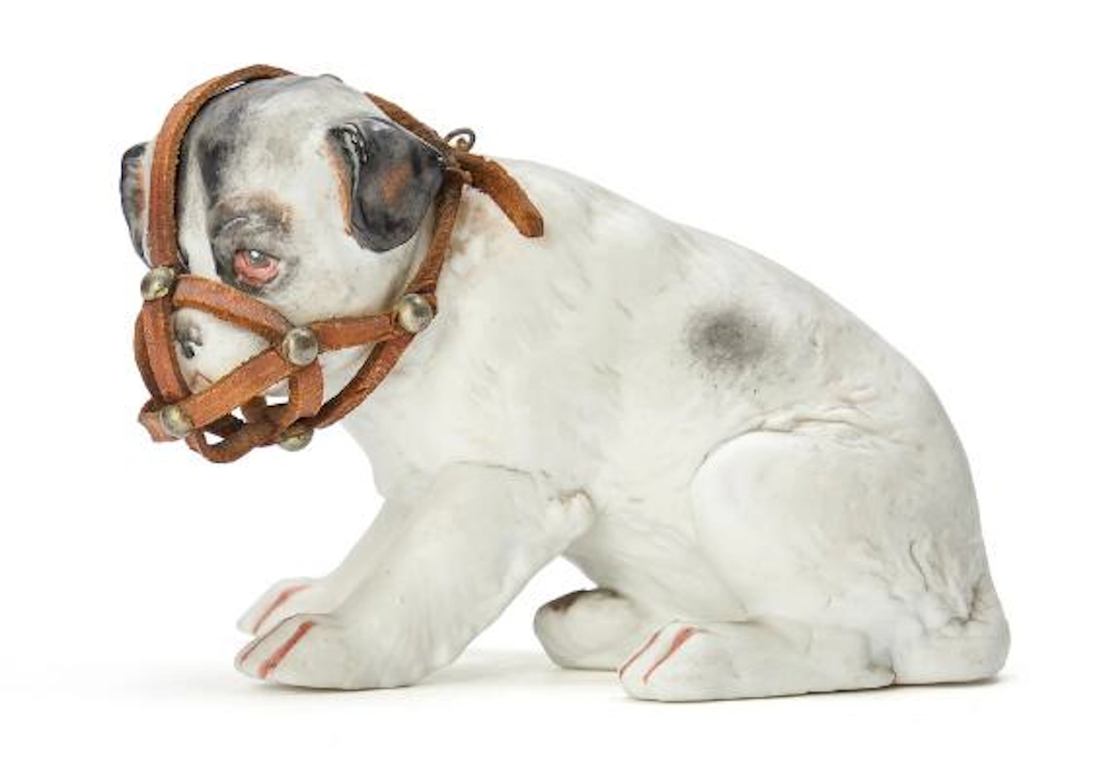Figure of partially painted porcelain in the form of a puppy, with