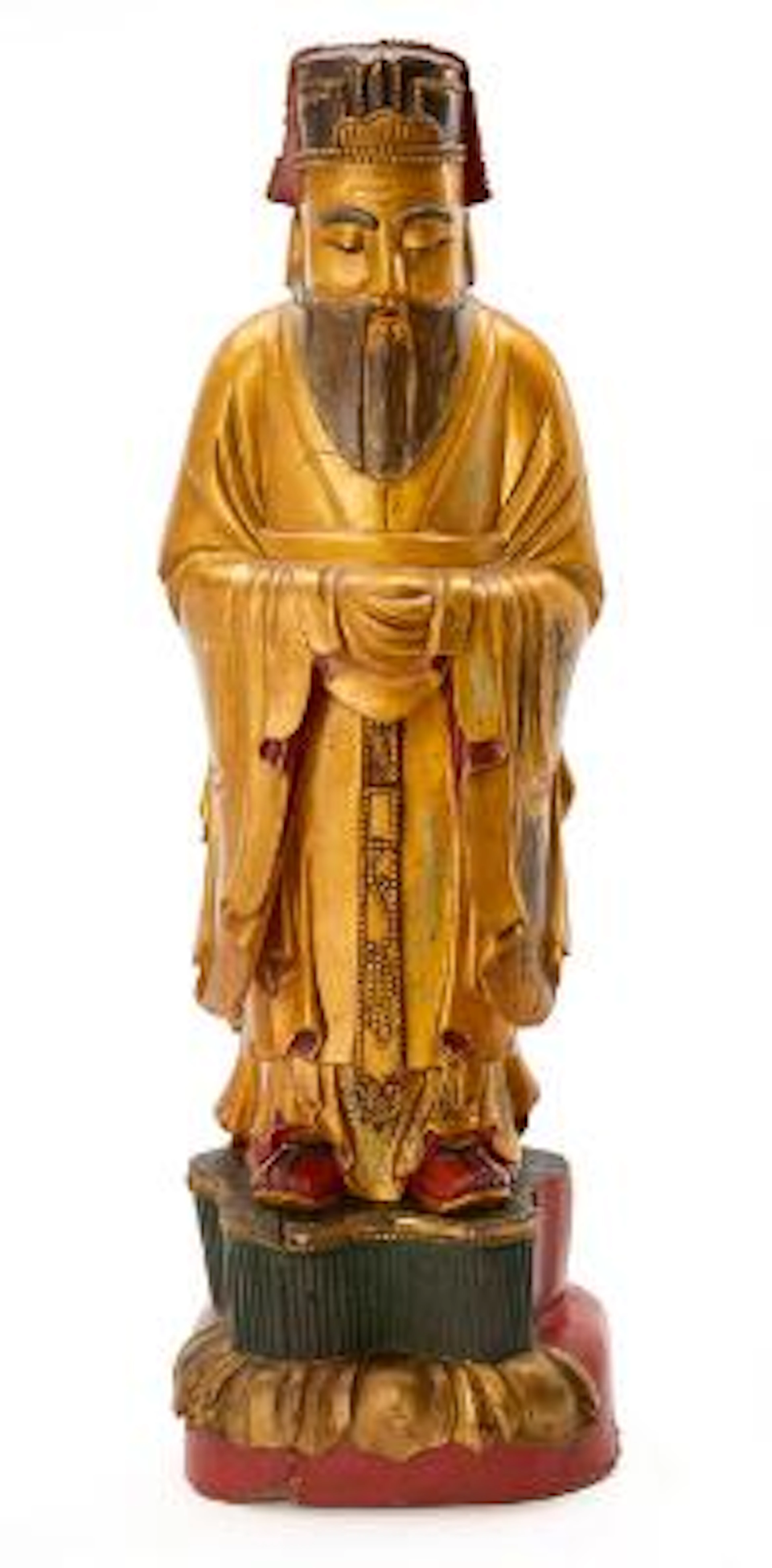 A Chinese carved giltwood figure of a Daoist Immortal. Qing dynasty