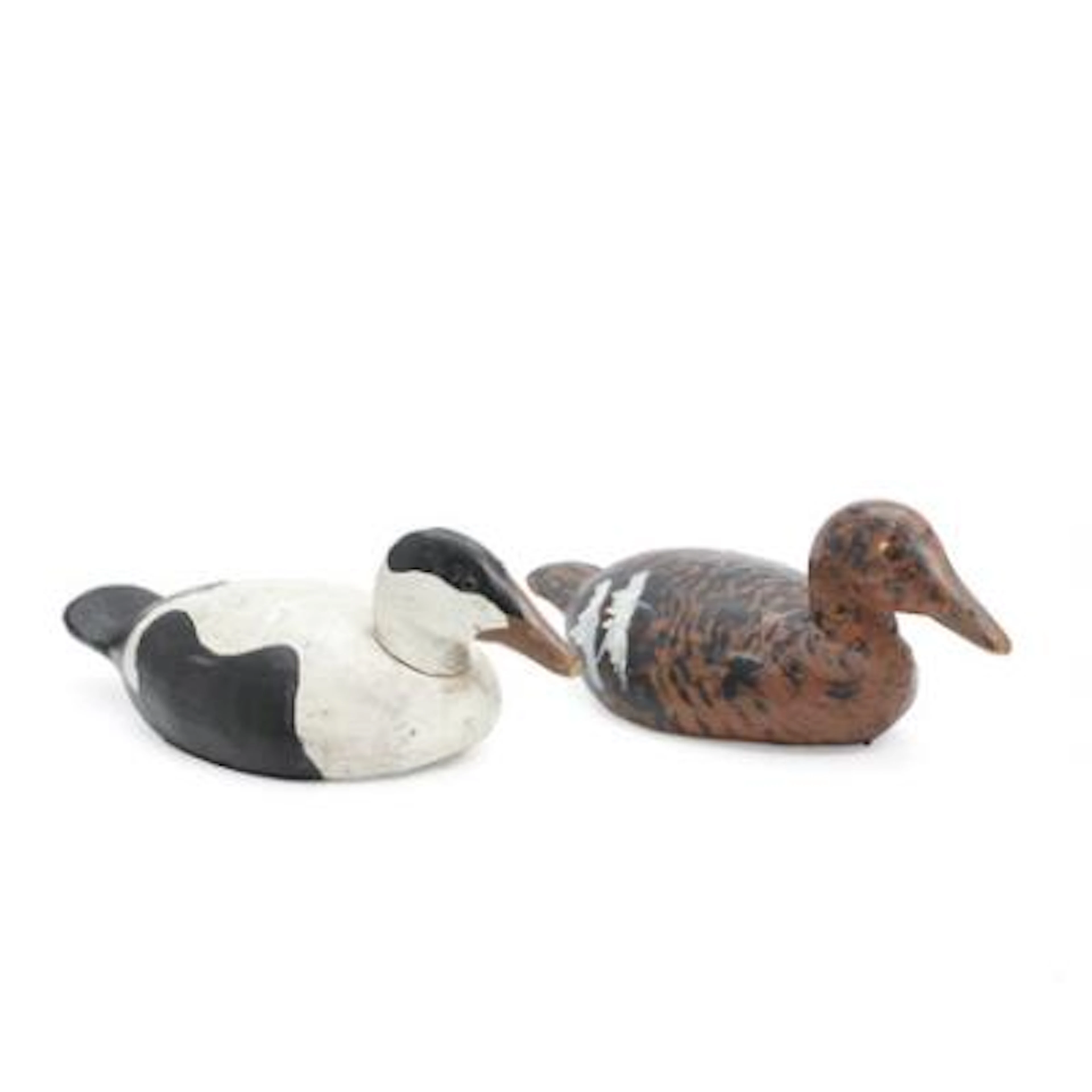 A pair of carved and painted decoy ducks. Early 20th century. L. 45