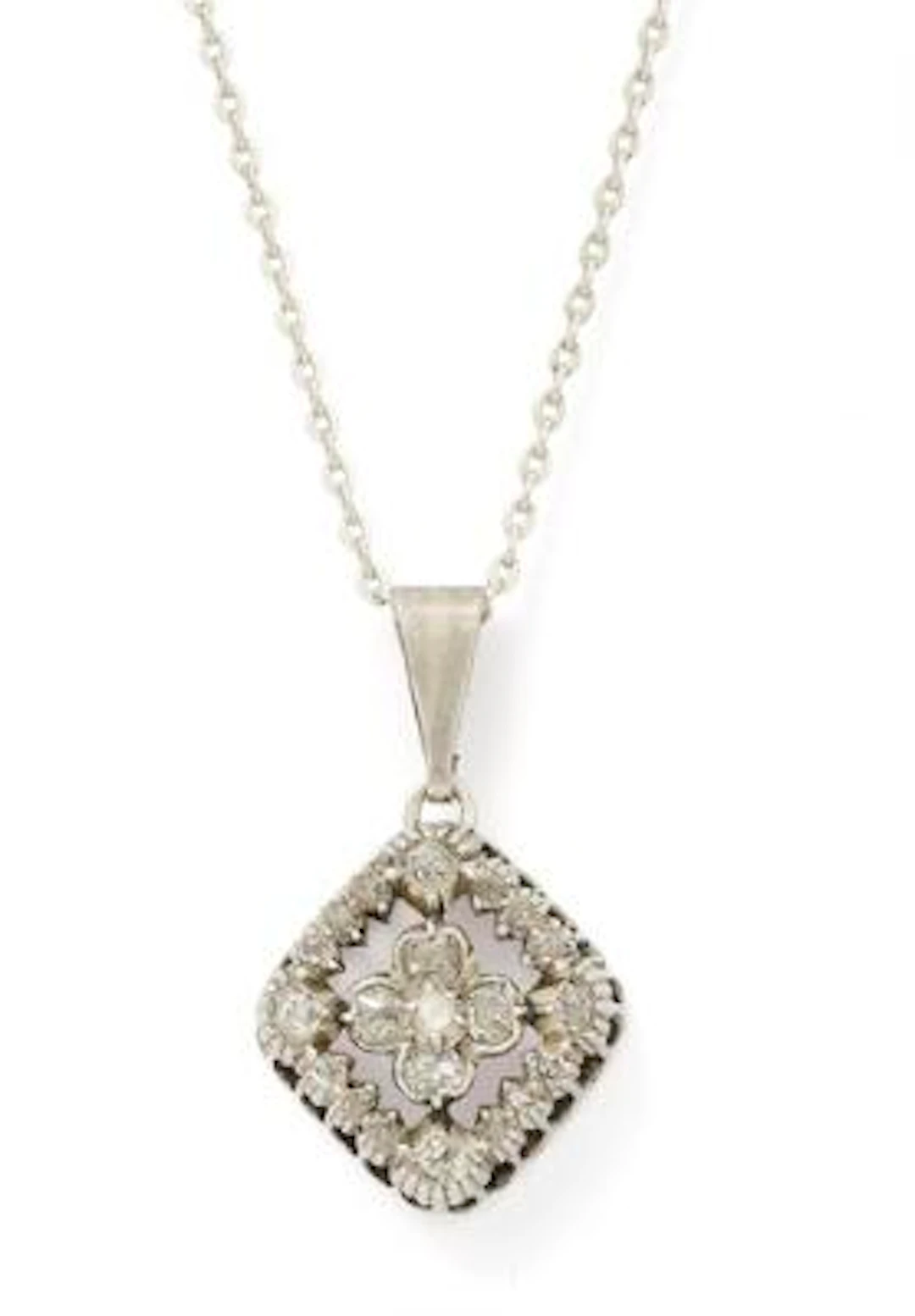 A diamond pendant set with diamonds, mounted in silver and a silver