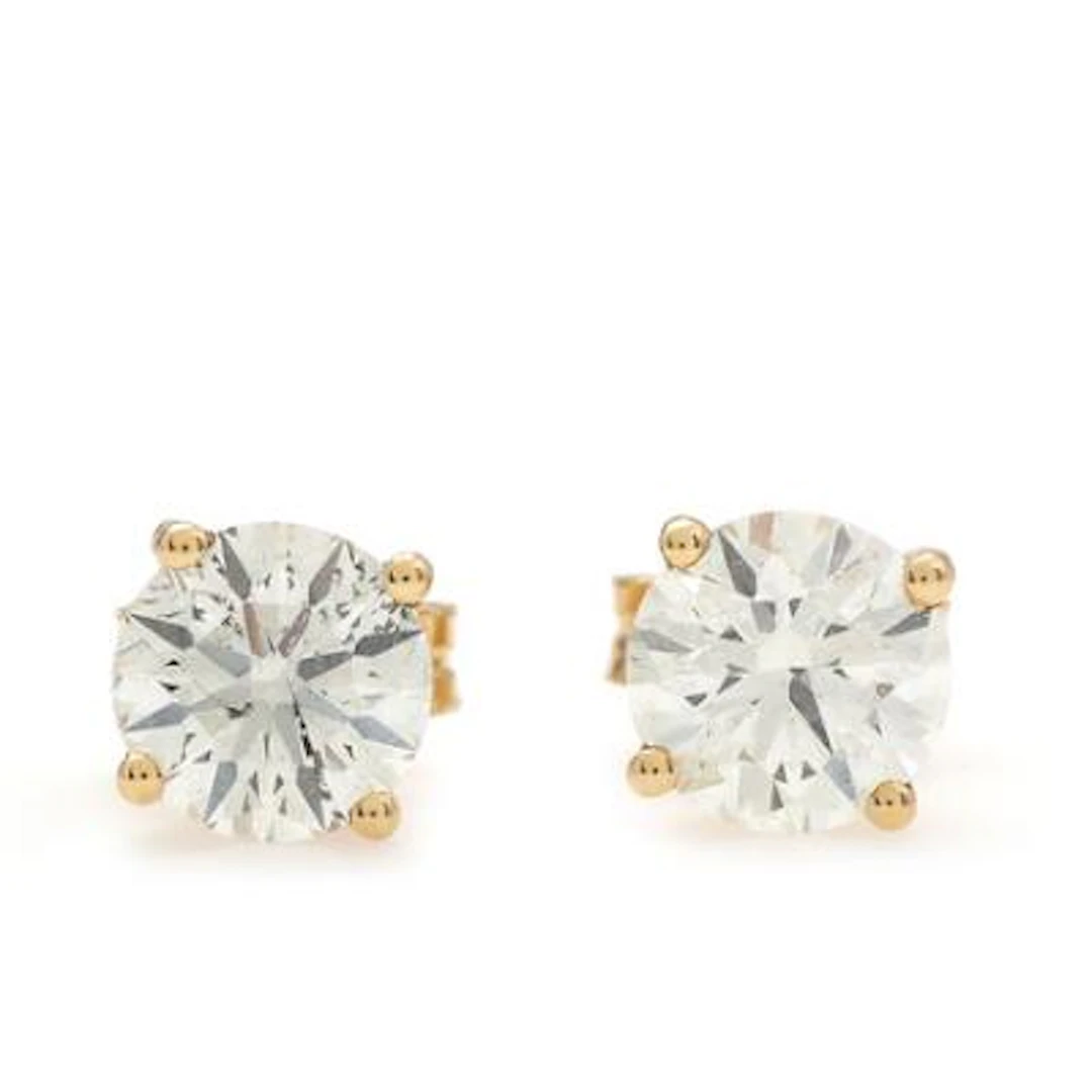 A pair of diamond ear studs, each set with a brilliant-cut diamond