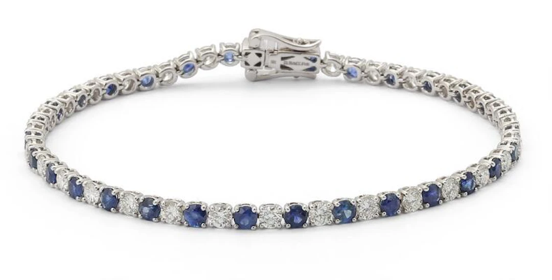 A sapphire and diamond bracelet set with sapphires and diamonds, mounted