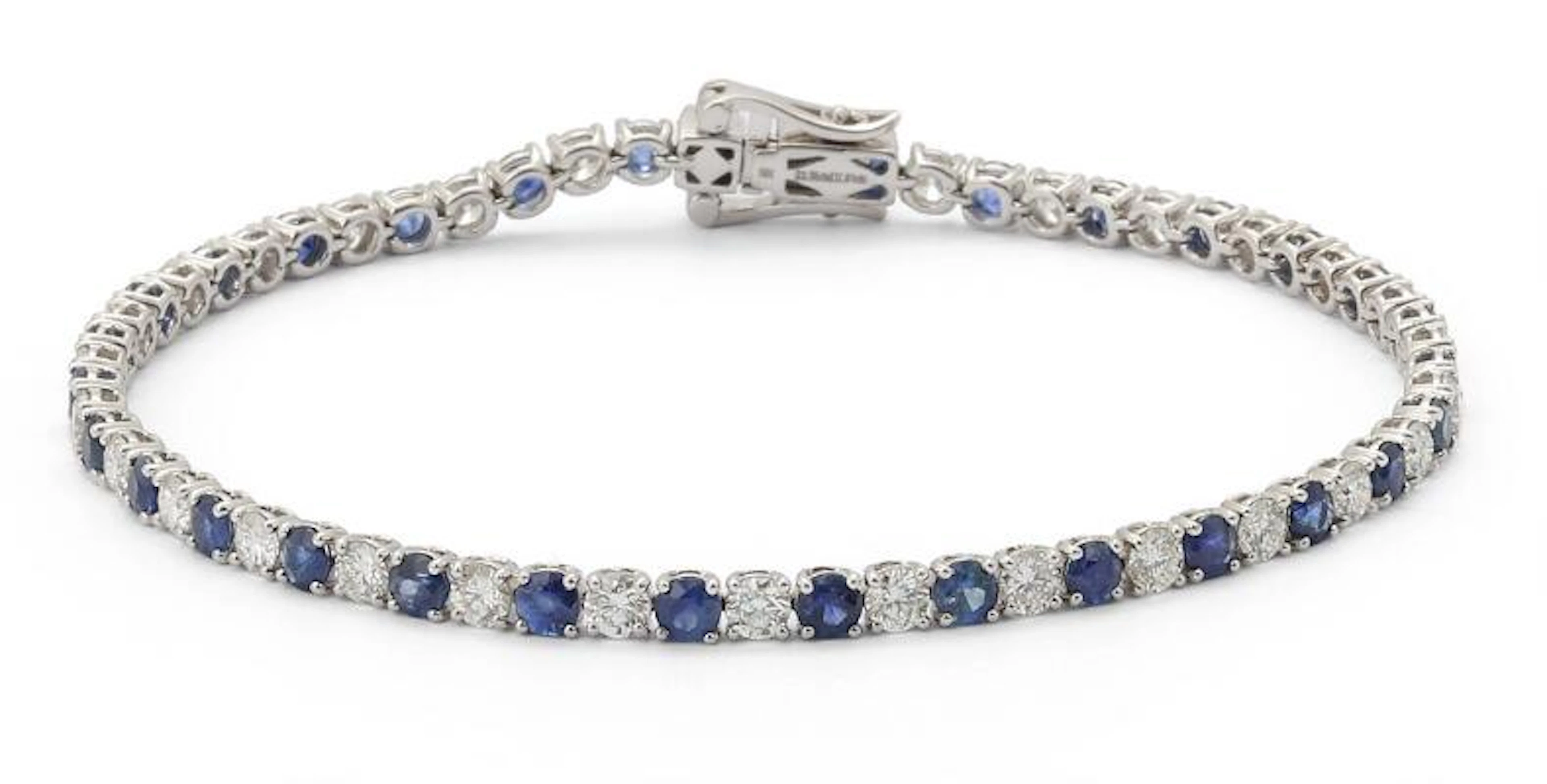 A sapphire and diamond bracelet set with sapphires and diamonds, mounted