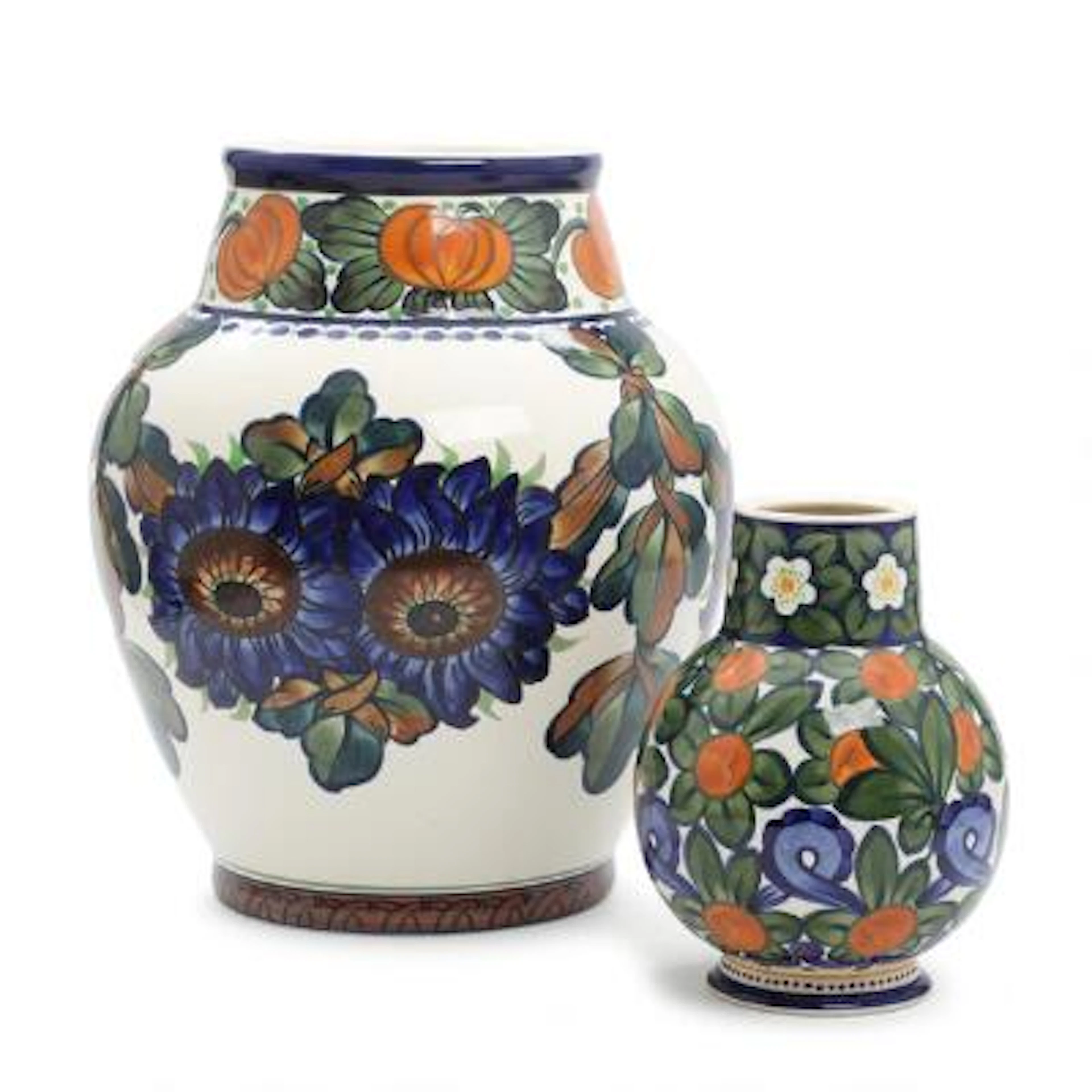 Harald Slott-Møller: Two faience vases decorated in colours with flowers