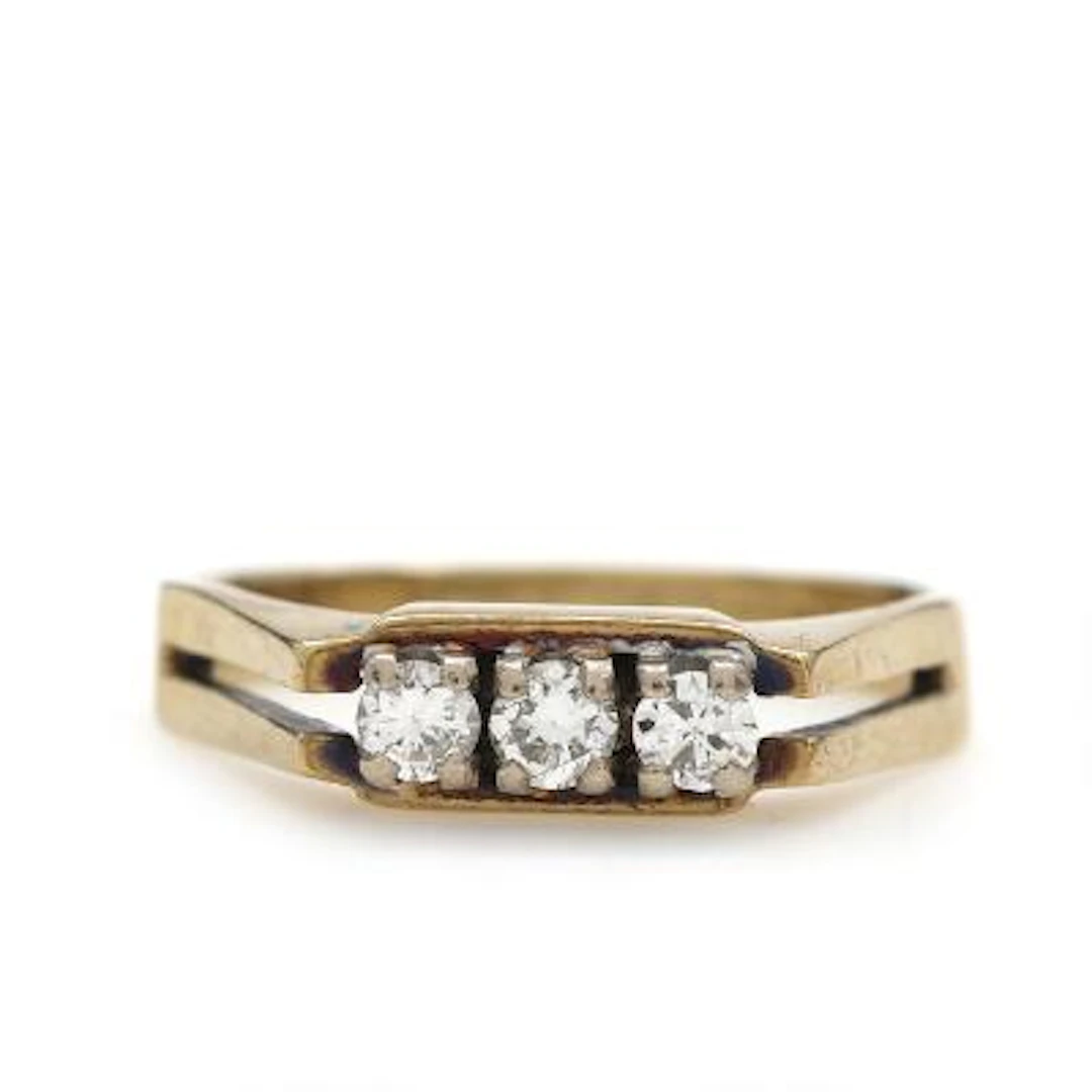A diamond ring set with diamonds, mounted in 14k gold and white gold.