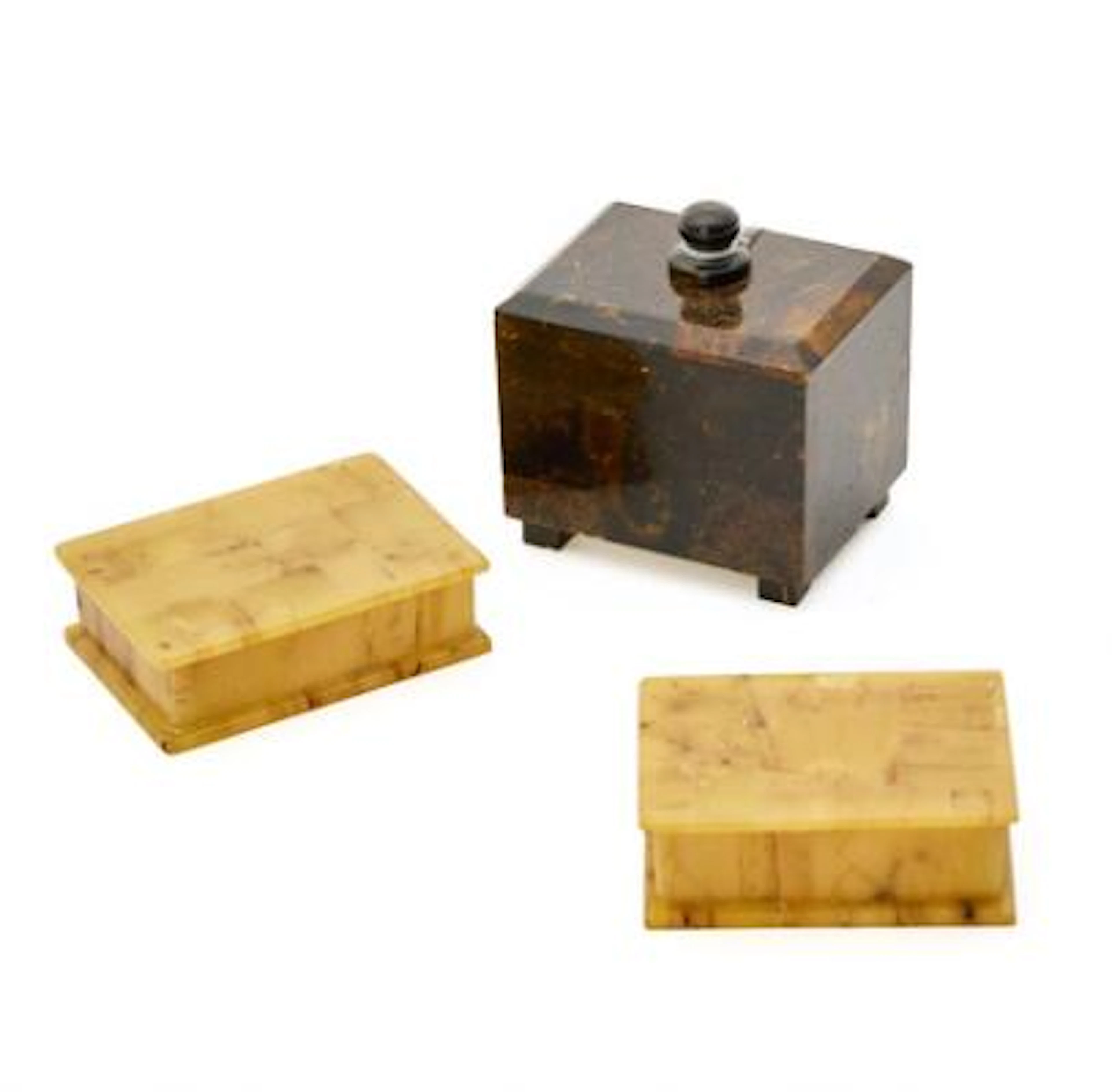 Three miniature amber caskets. Combined weight 128 g. H. 2–6 cm. (3)