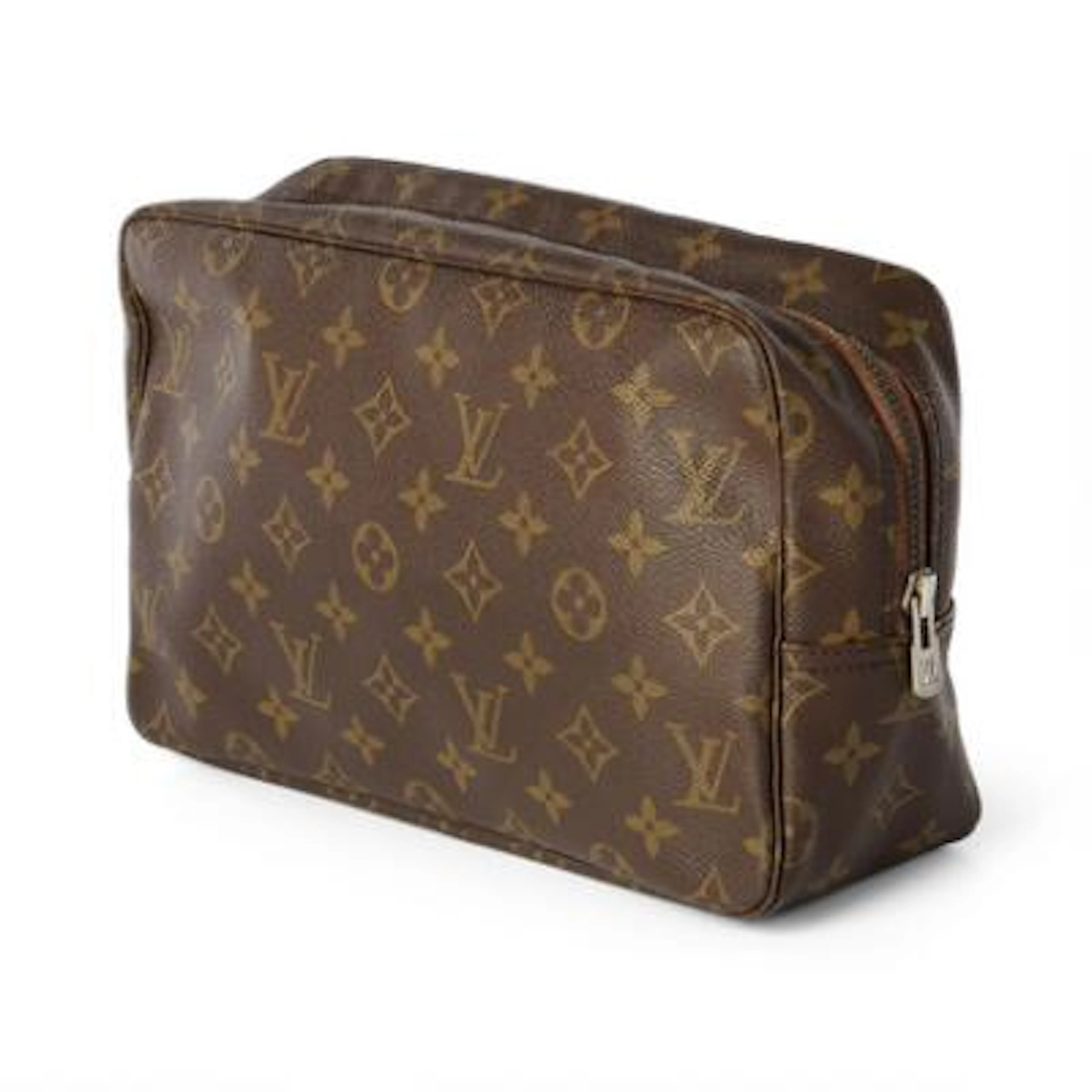 Louis Vuitton: A "Trousse Toilette 28" of brown monogram canvas with