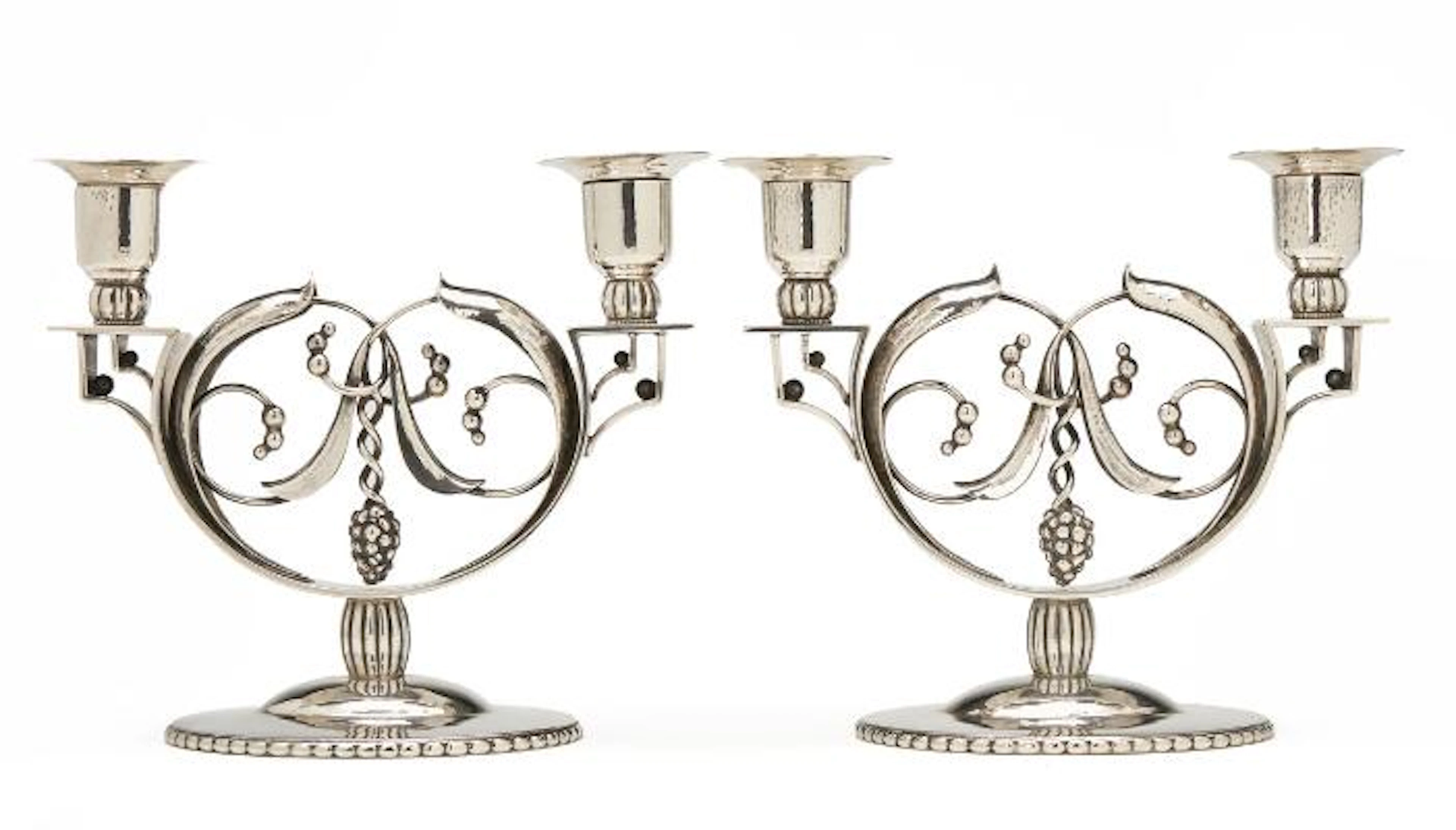 Fritz Heimbürger: A pair of two-light candelabra of silver with leaves