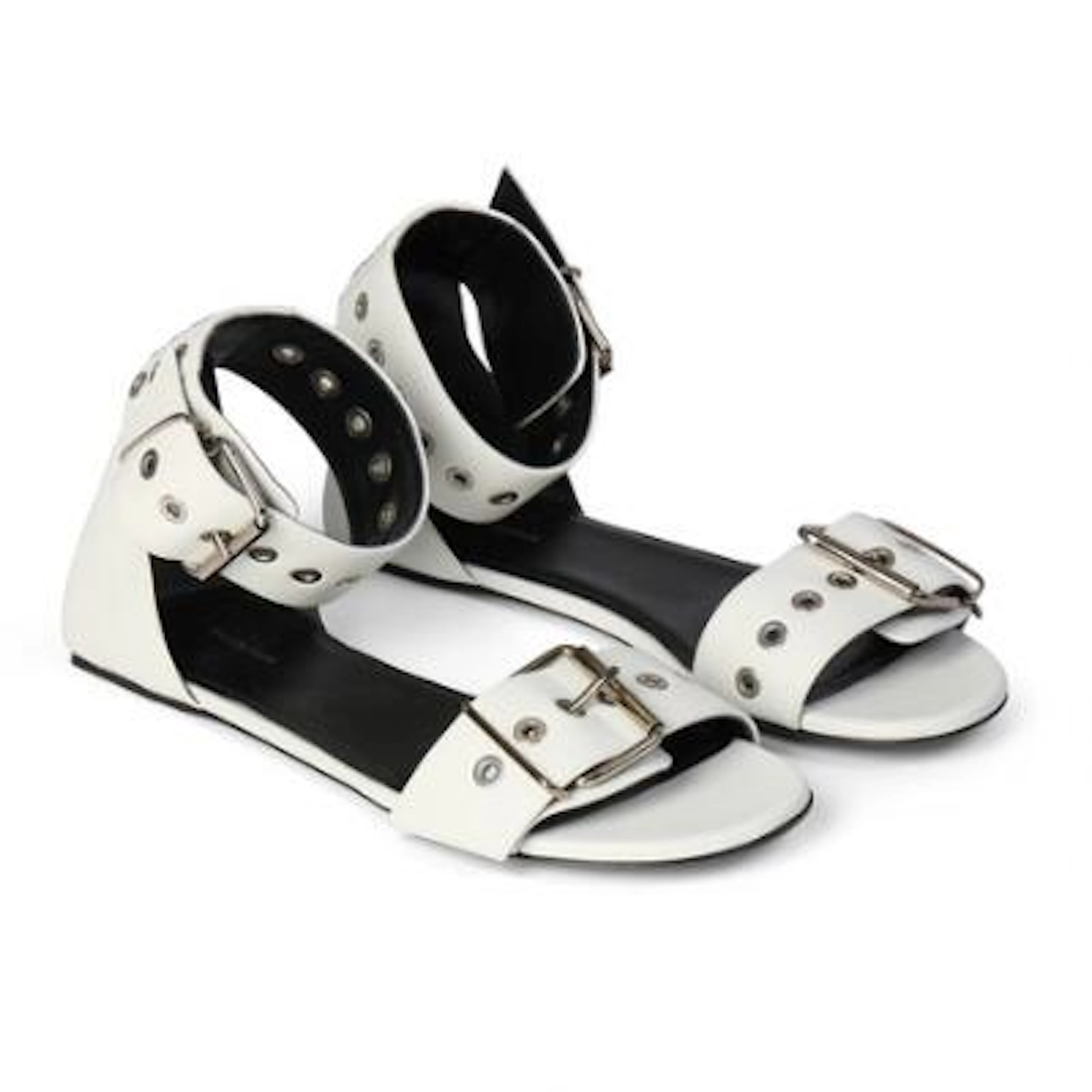 Balenciaga: A pair of "City Uptown Ankle-Strap" white leather sandals.
