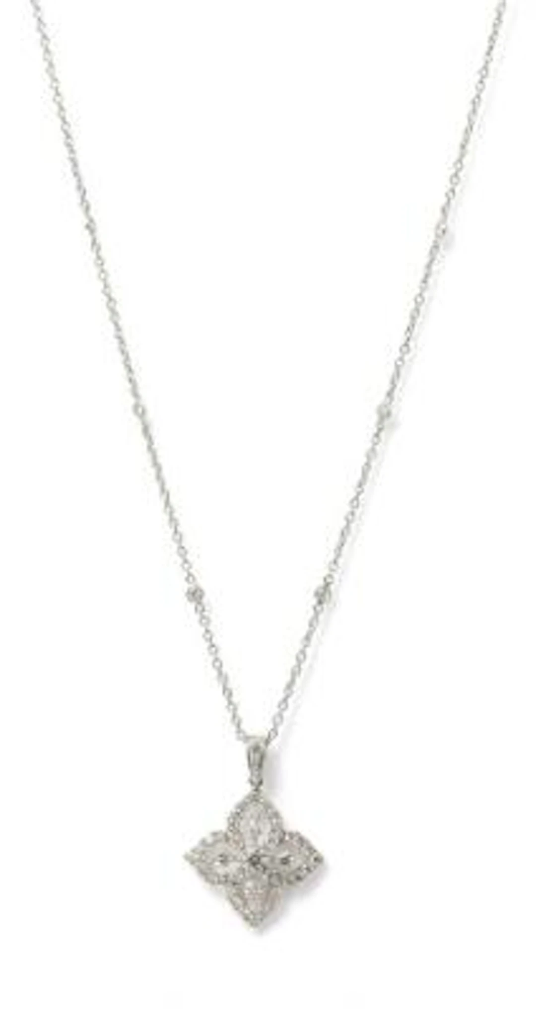A diamond pendant and -necklace set with diamonds, mounted in 18k