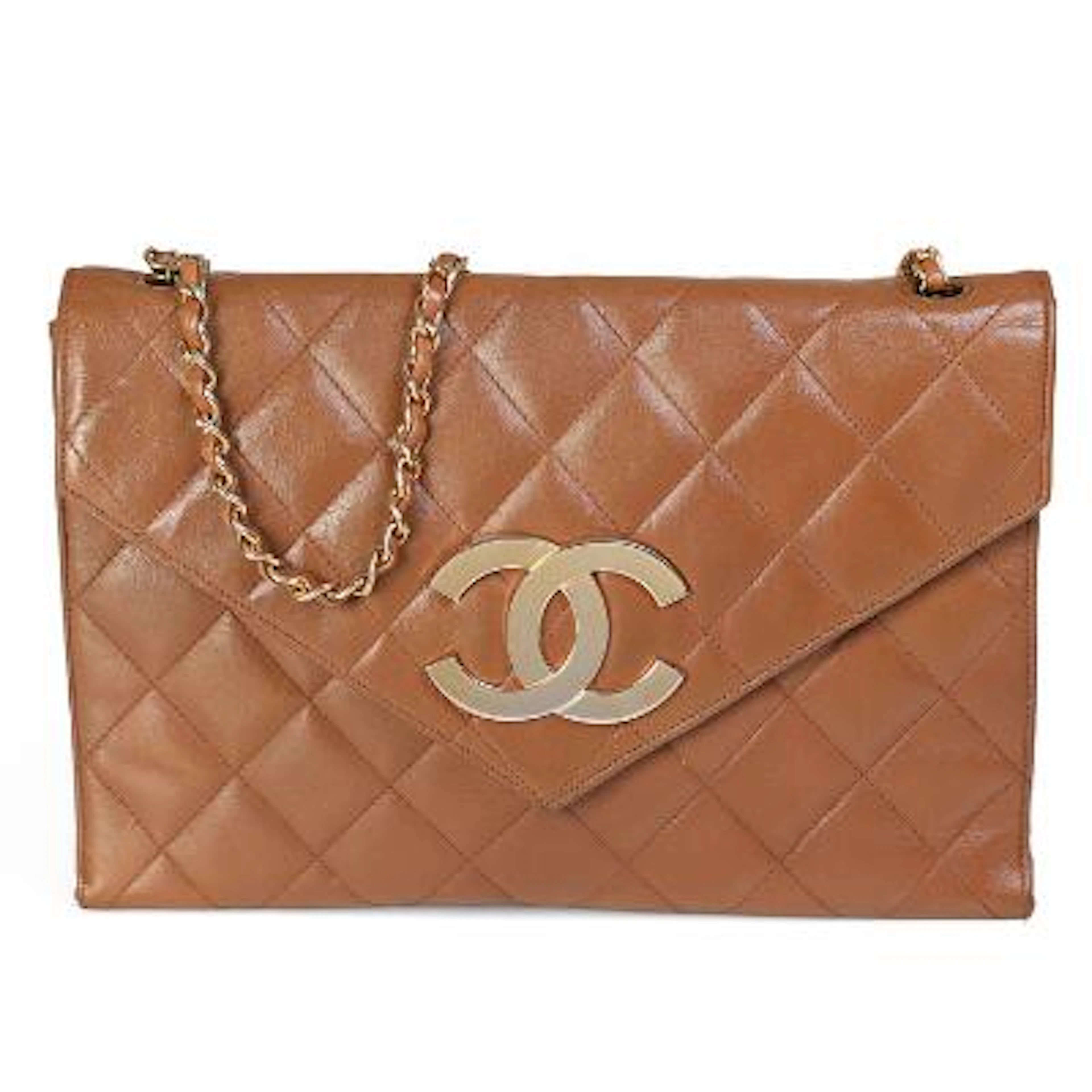 Chanel: A vintage flap bag of brown quilted leather with gold tone