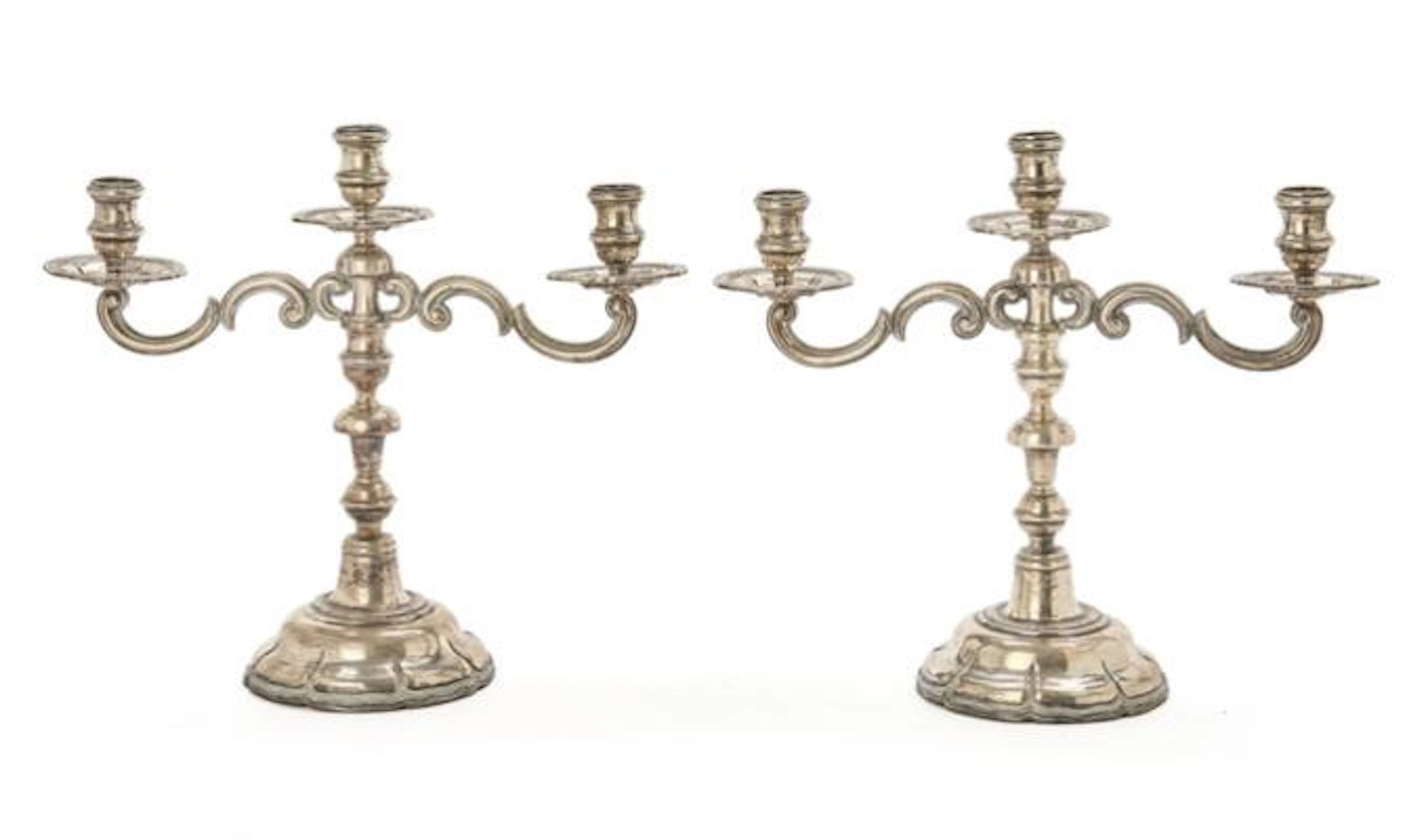 A pair of sterling silver candelabra, Mexico, 20th century. Weight