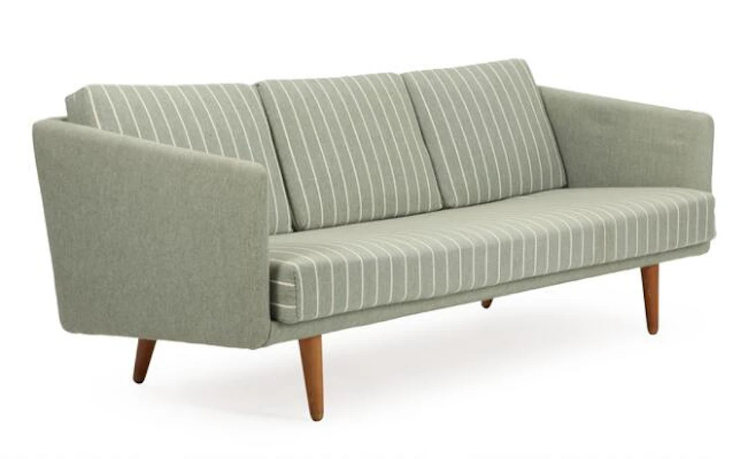 Børge Mogensen: A freestanding three seater sofa with oak legs, upholstered