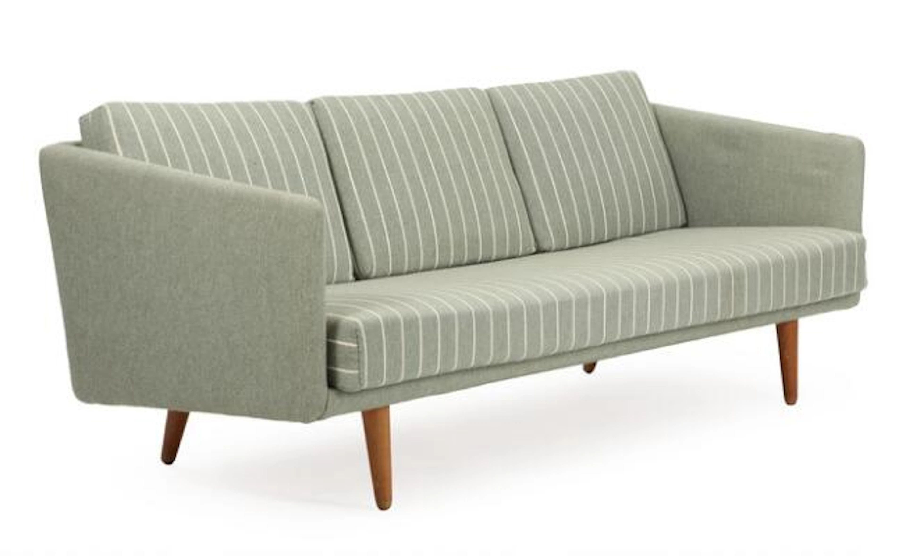 Børge Mogensen: A freestanding three seater sofa with oak legs, upholstered