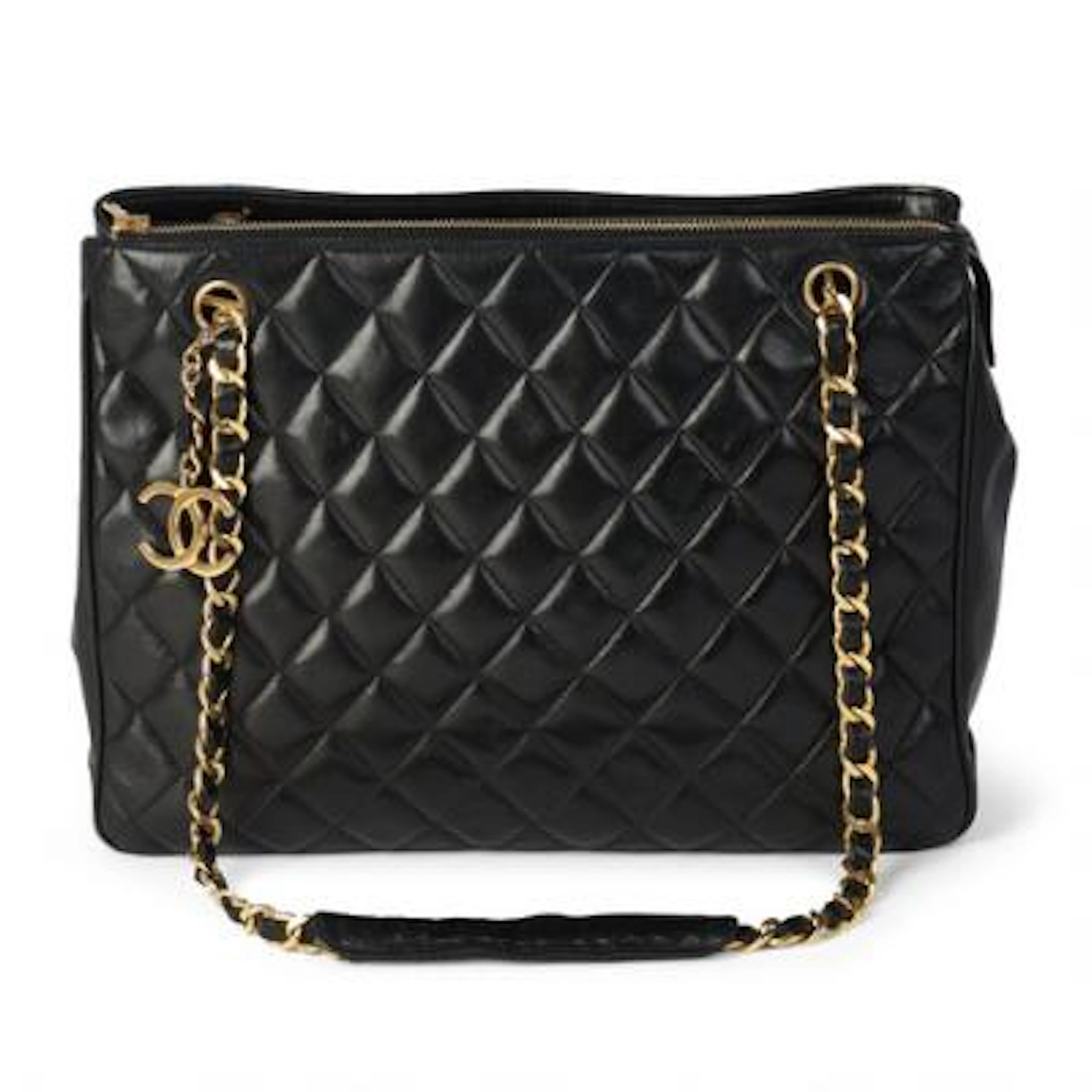 Chanel: A black vintage tote bag of black quiltet leather with gold