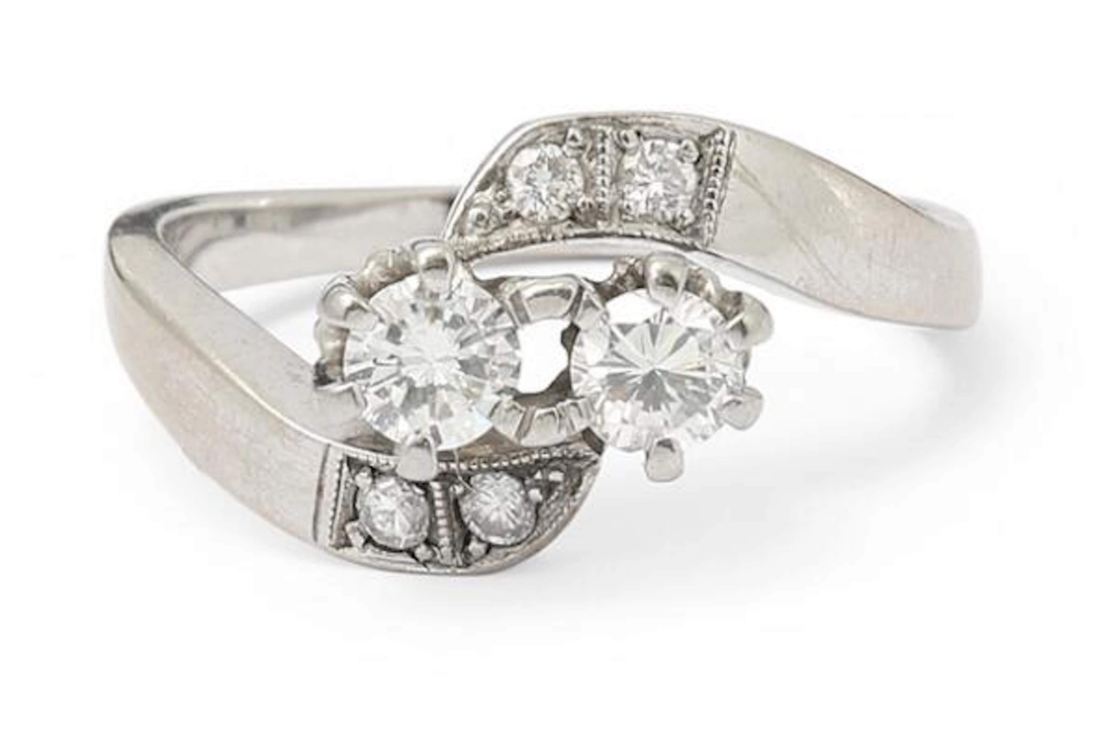 A diamond ring set with nunerous brilliant-cut diamonds, mounted in