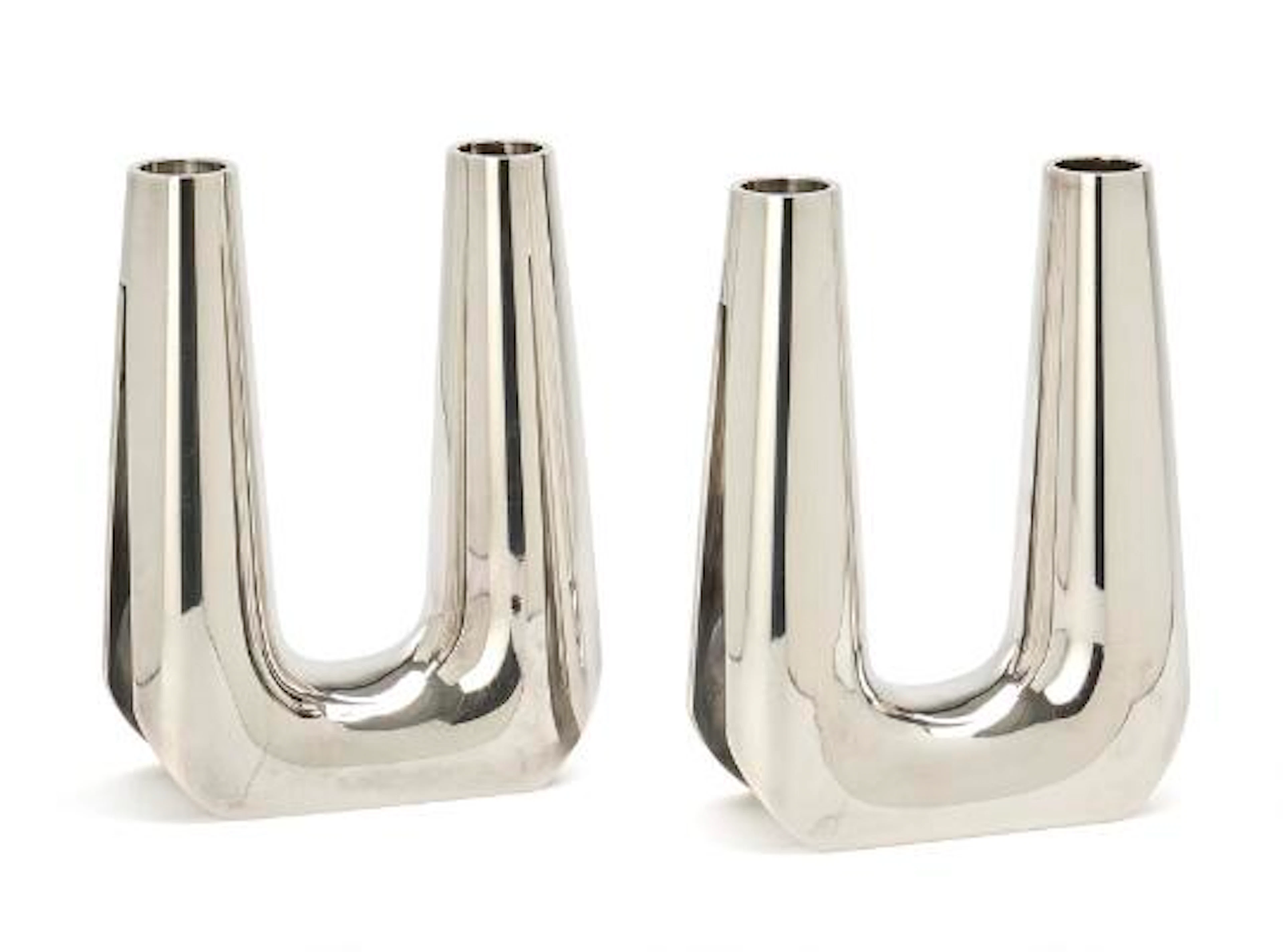 Søren Georg Jensen: A pair of sterling silver candelabra with smooth