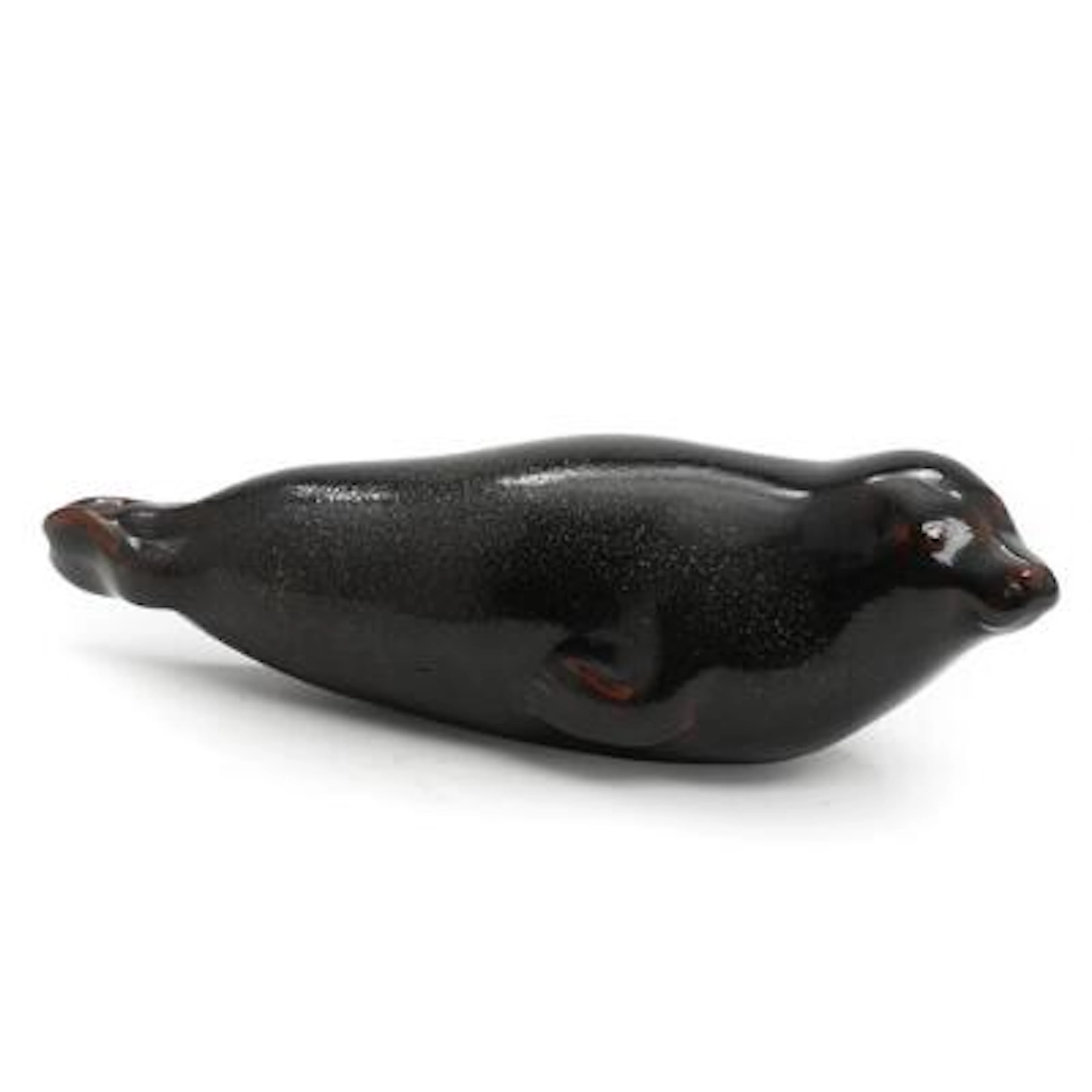Jeanne Grut: Seal. A stoneware figurine. Decorated in dark brown glaze.