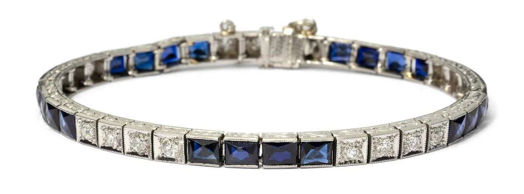 A sapphire and diamond bracelet set with sapphires and diamonds, mounted