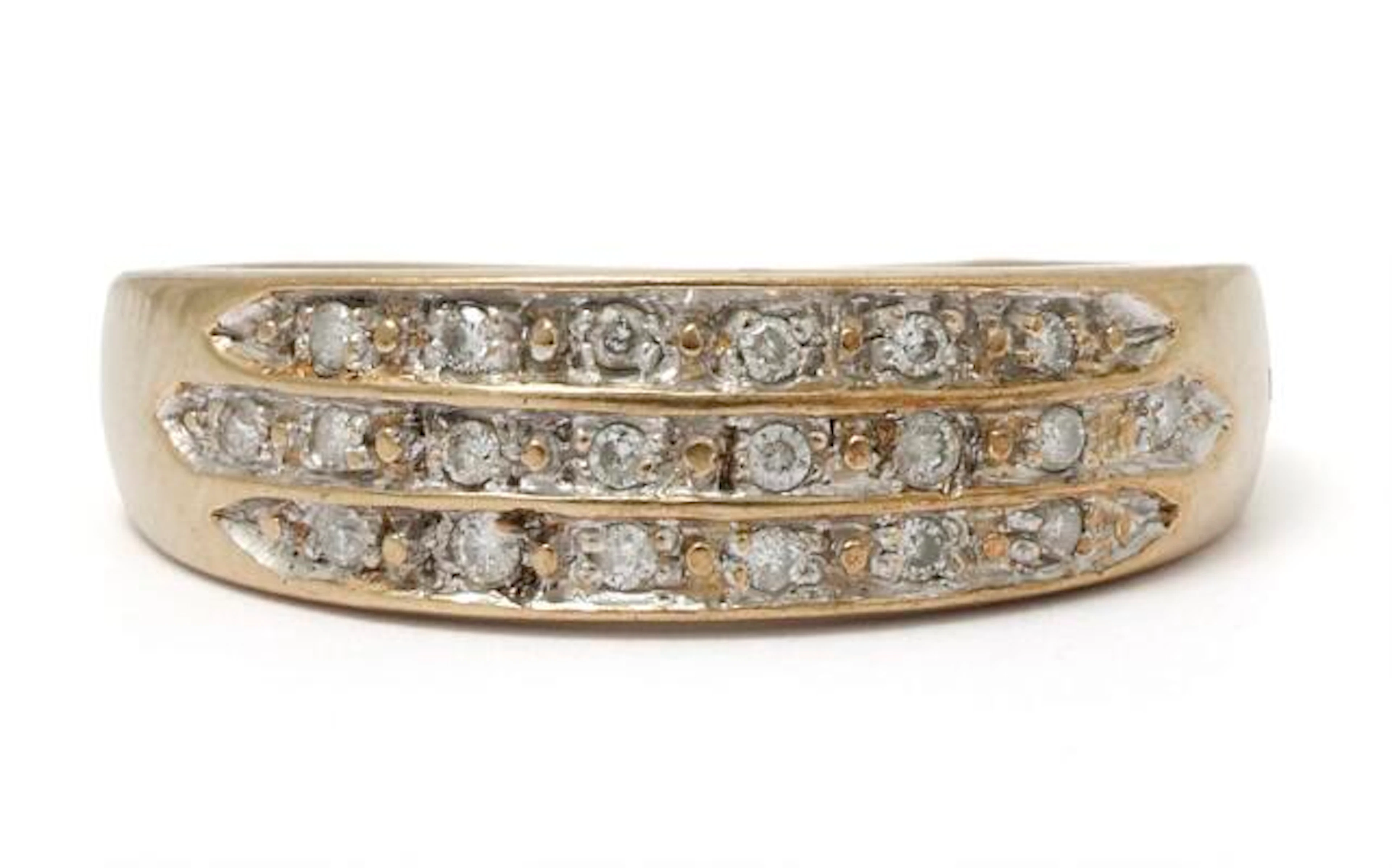 A diamond ring set with numerous brilliant-cut diamonds, mounted in