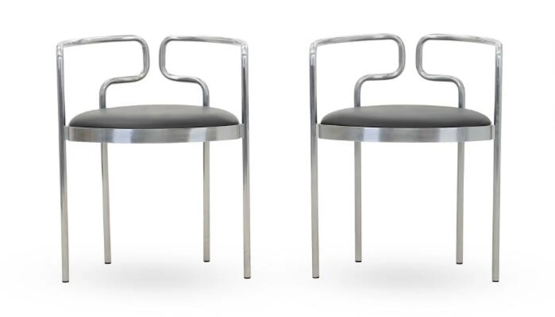 Henning Larsen: A pair of armchairs with chromed steel frame. Seat
