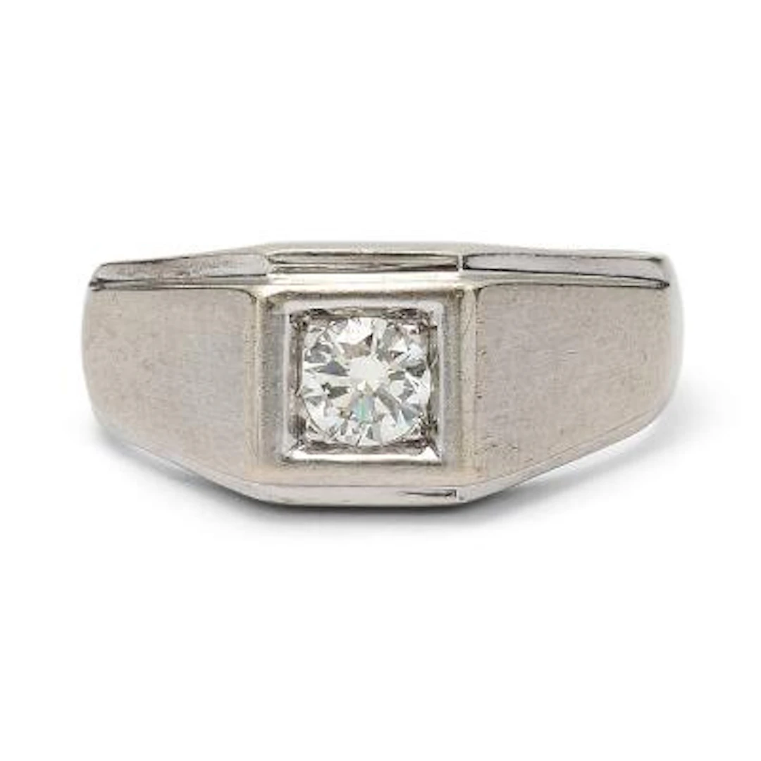 A diamond ring set with a brilliant-cut diamond weighing app. 0.30