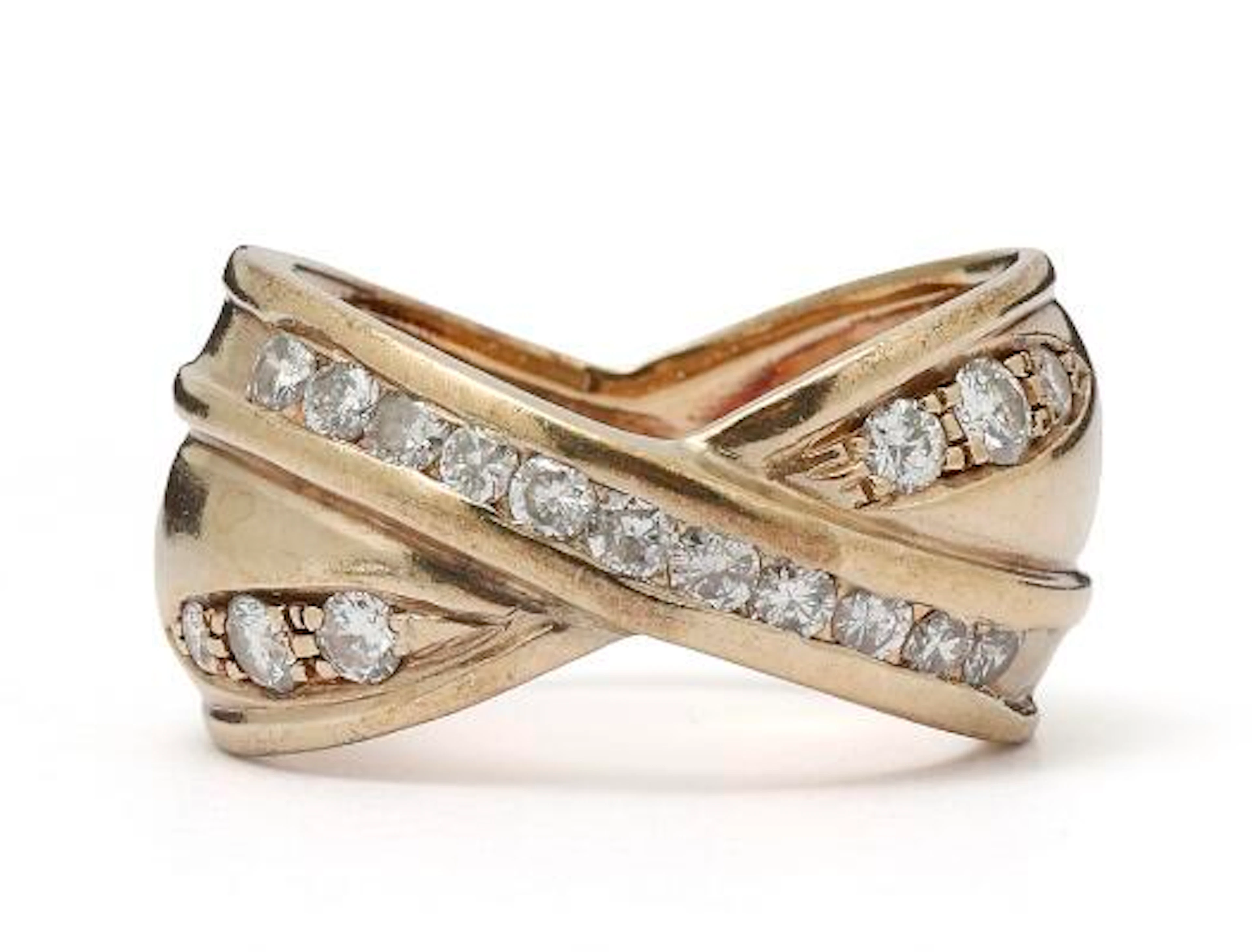 A diamond ring set with brilliant-cut diamonds, mounted in 14k gold.