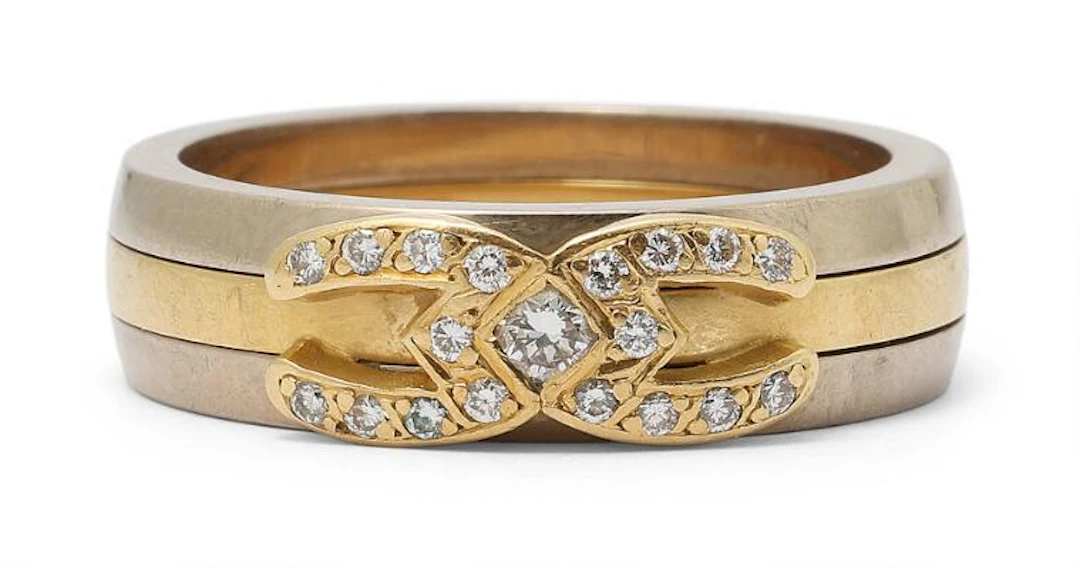 A diamond ring set with numerous brilliant-cut diamonds, mounted in