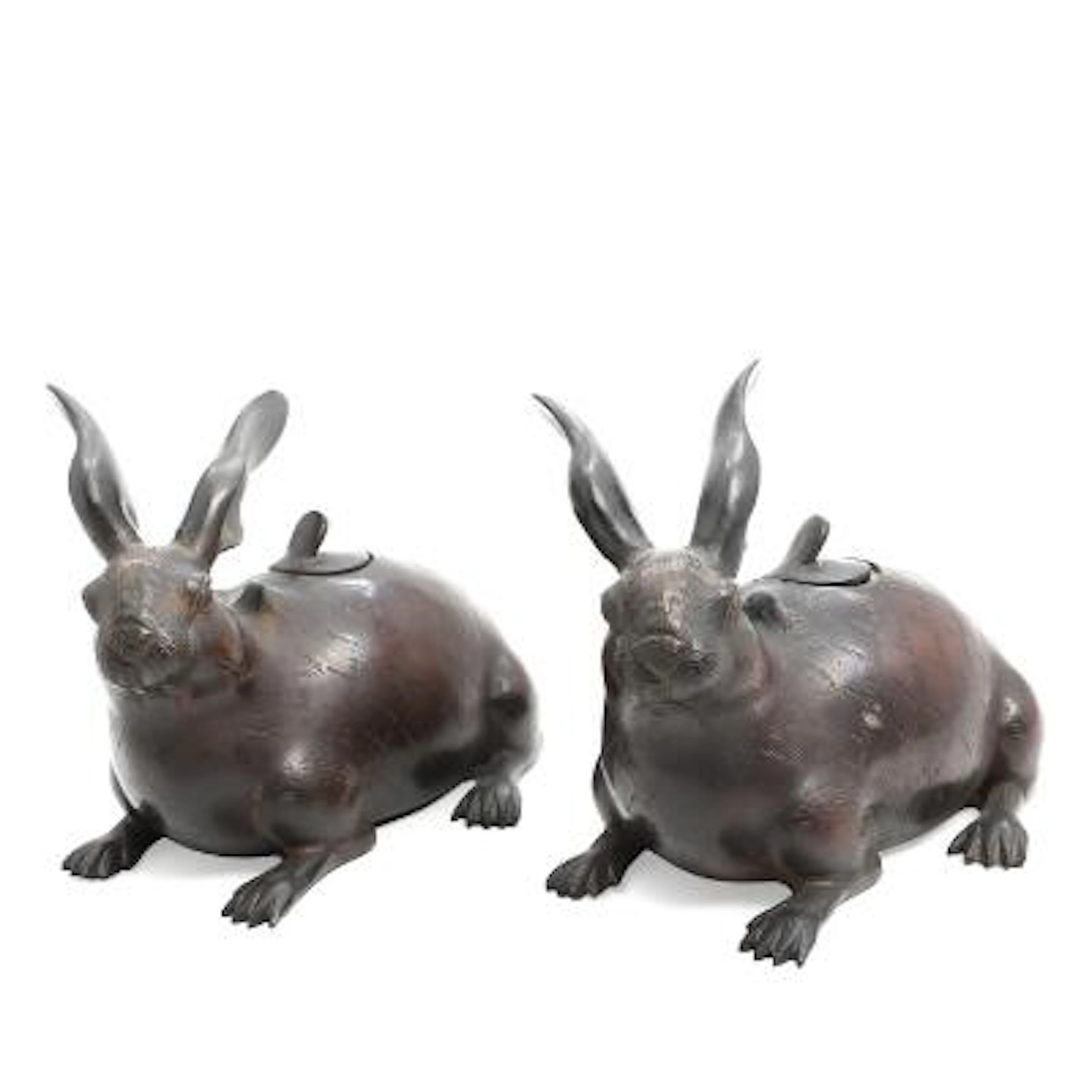 A pair of Japanese koro incense burners of patinated bronze in the