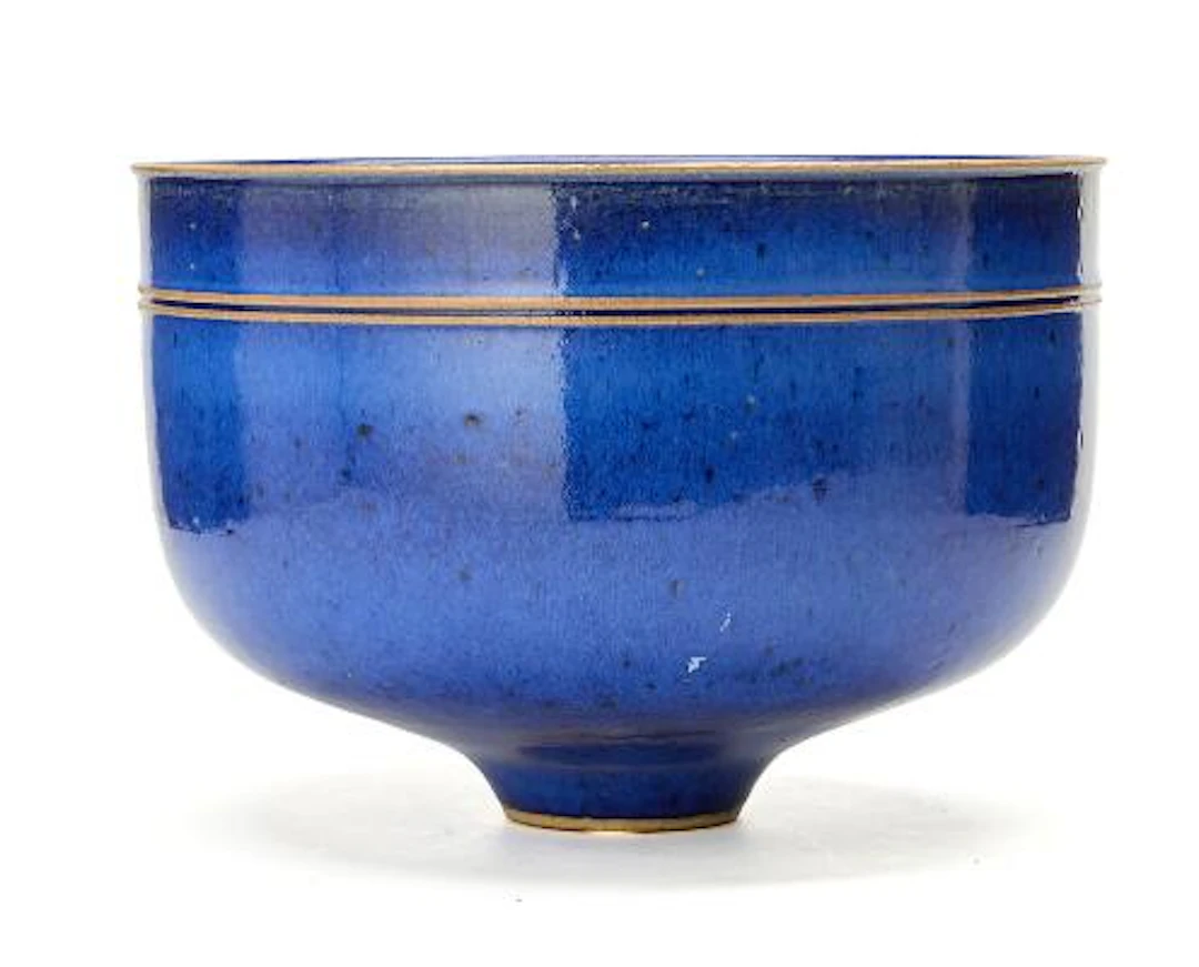 Inger Thing: A large circular stoneware bowl with moulded profiled