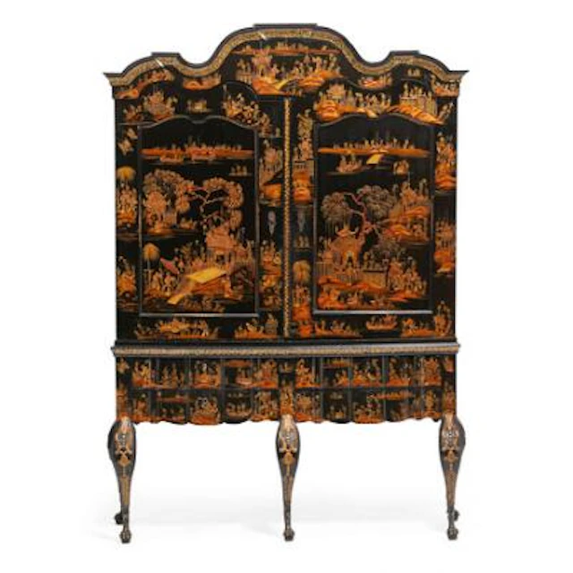 A large Dutch Rococo style cupboard of black laquer decorated with