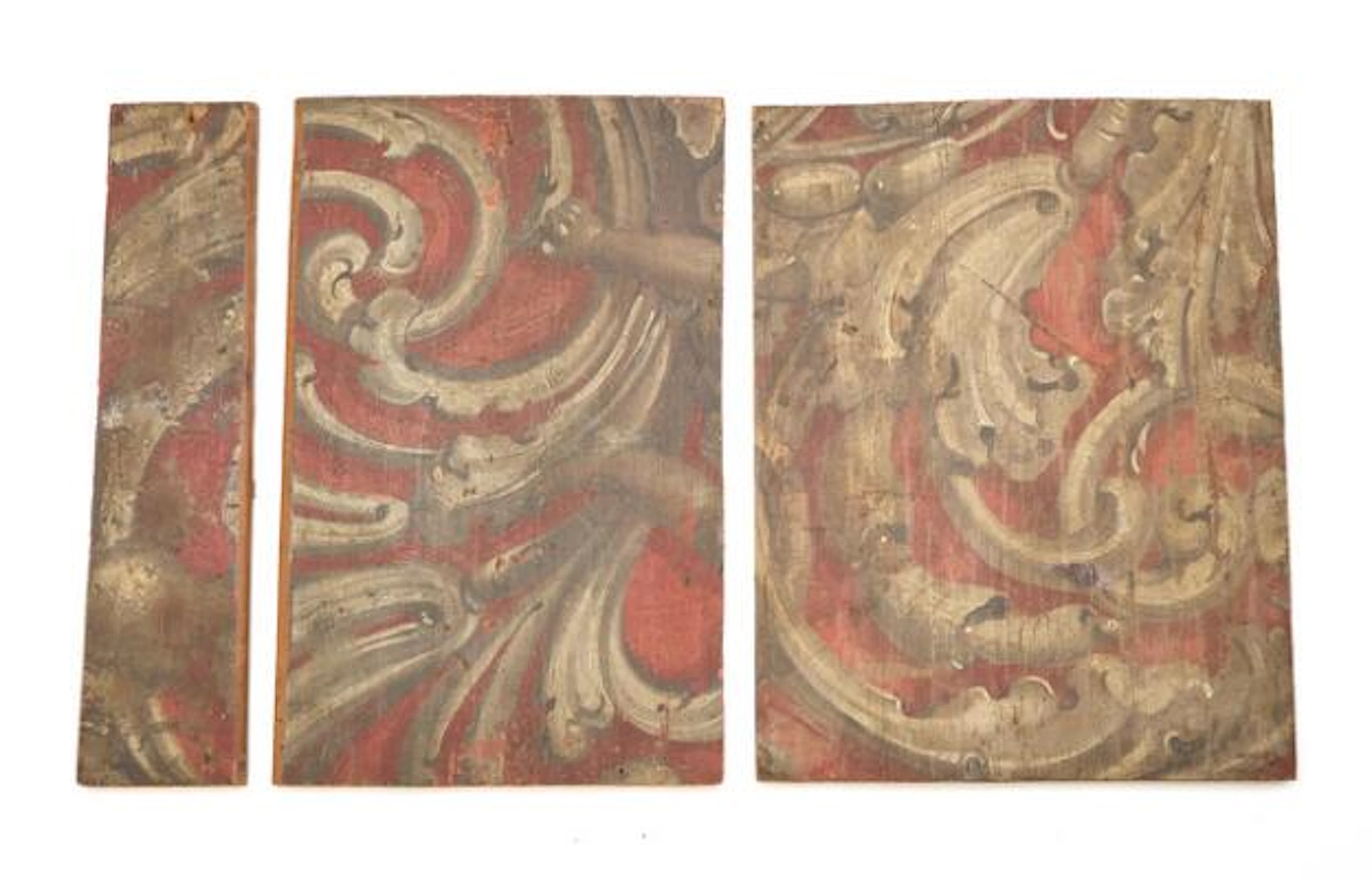 Three Baroque wood panel fragments, decorated in brown and white with