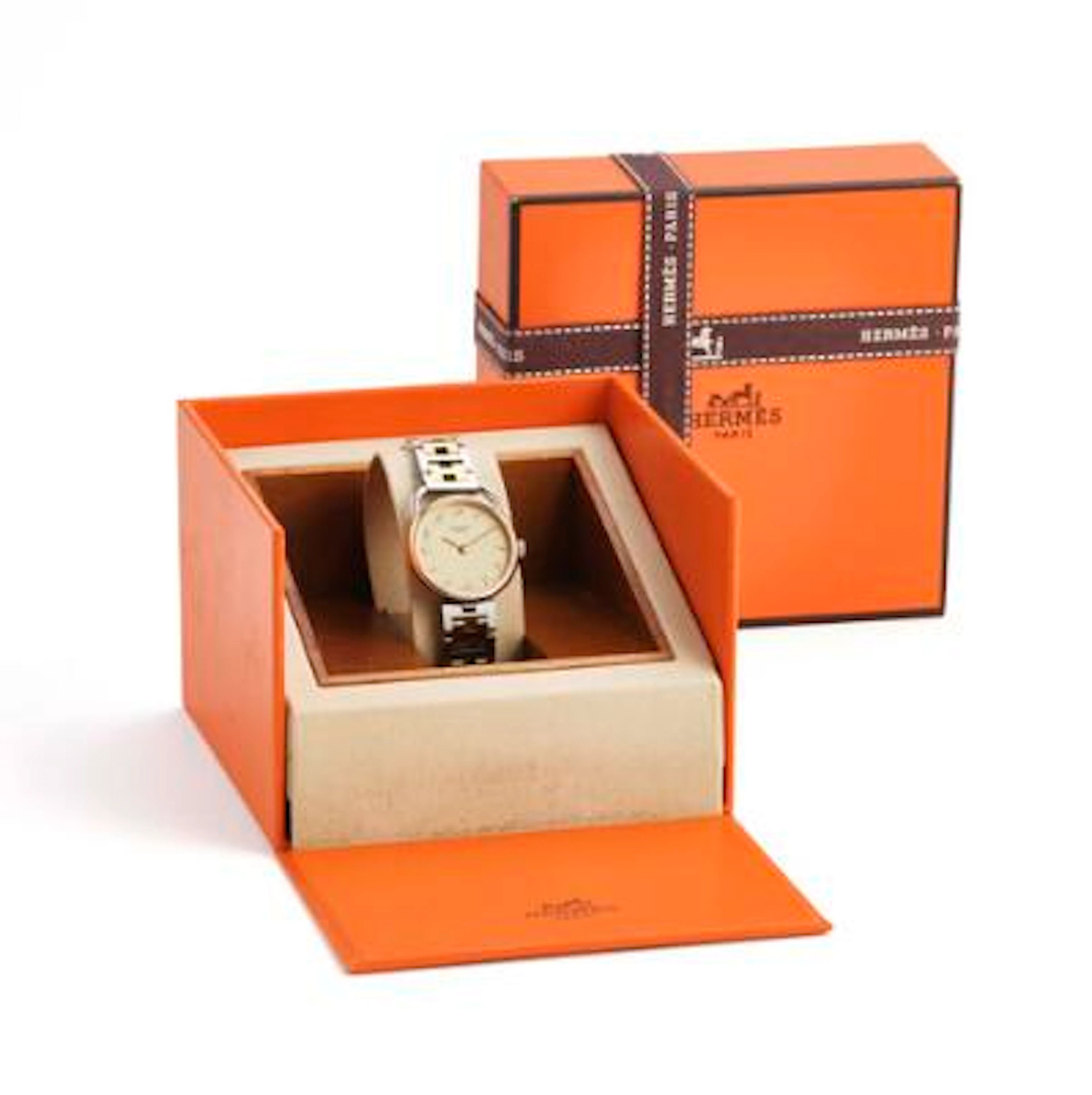 Hermès: Arceau of 18k gold and steel, ref. 666563 A. Quartz movement